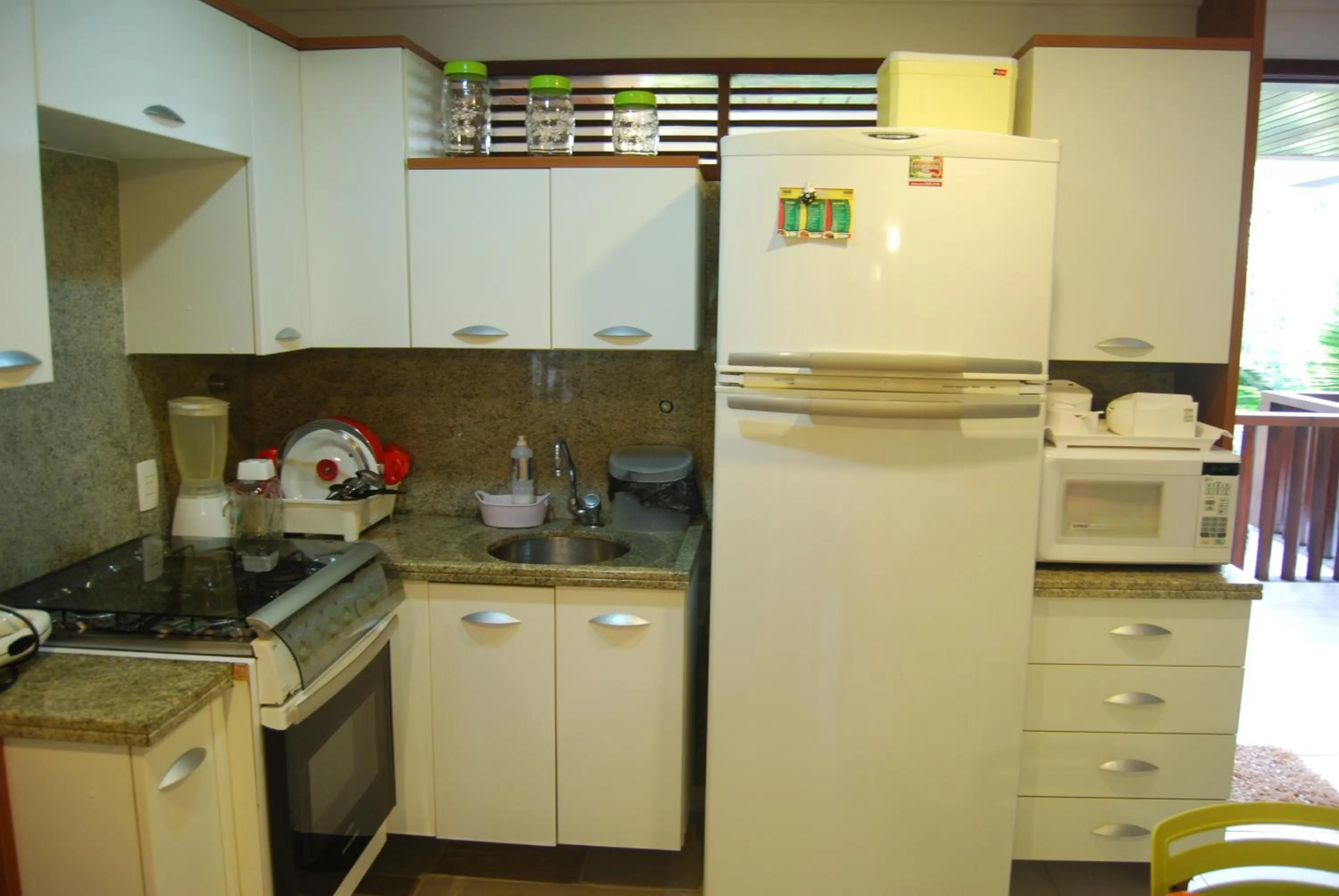 Kitchen or kitchenette in Flats Nannai Residence Vilas