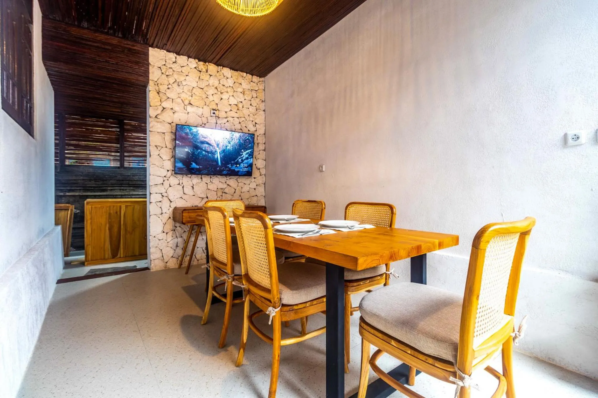 Communal lounge/ TV room in Alam Desa Homestay by AGATA