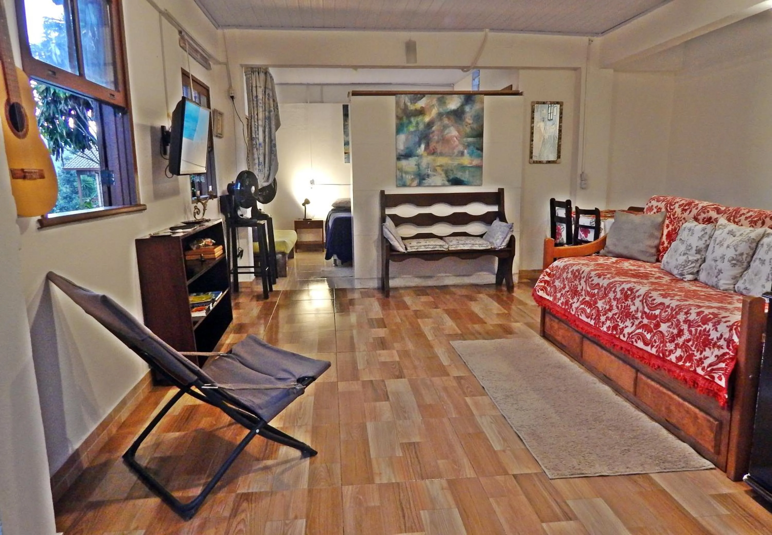 Living room, Bed in Chalés Van Gogh