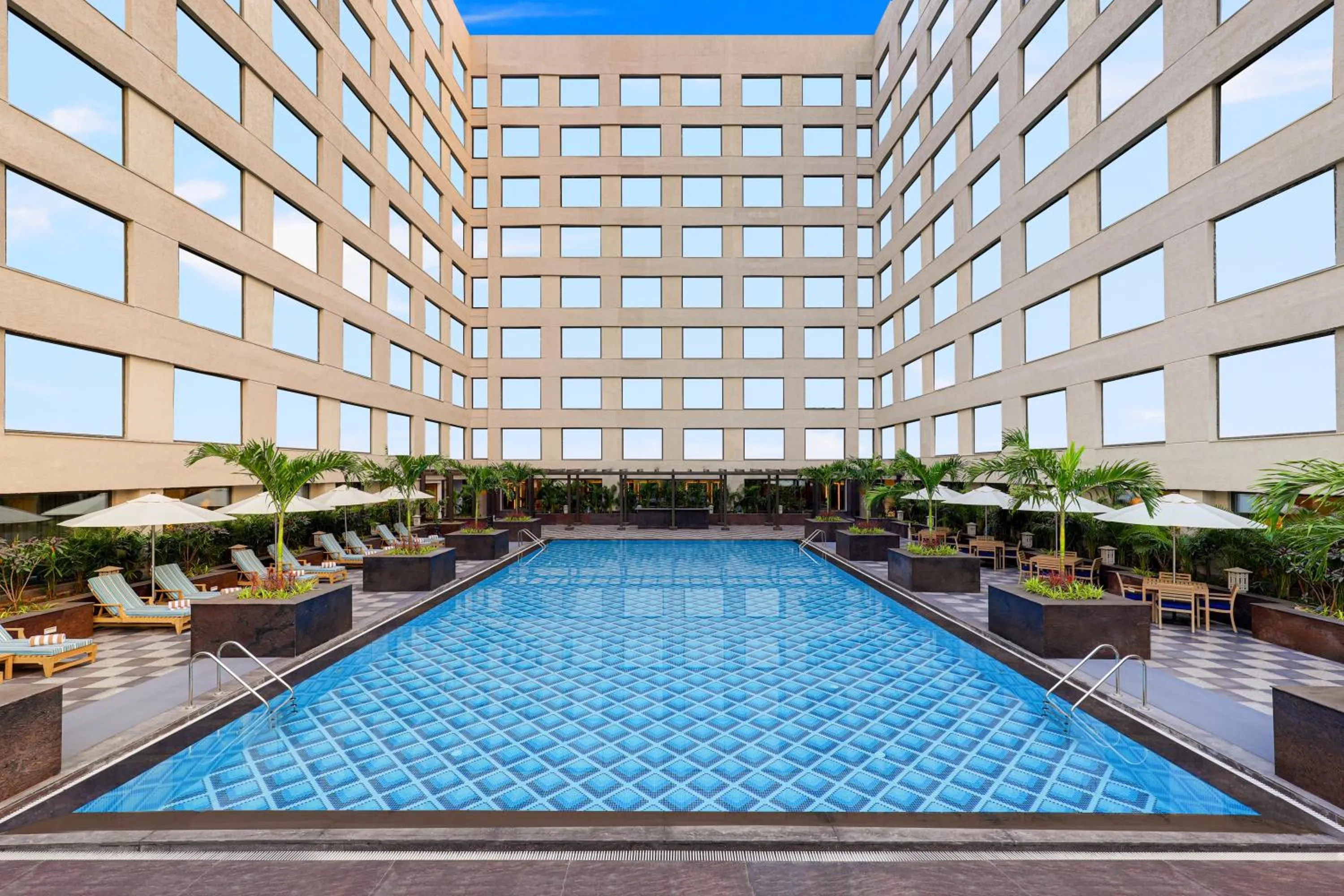 Swimming pool in Aurika, Mumbai International Airport - Luxury by Lemon Tree Hotels