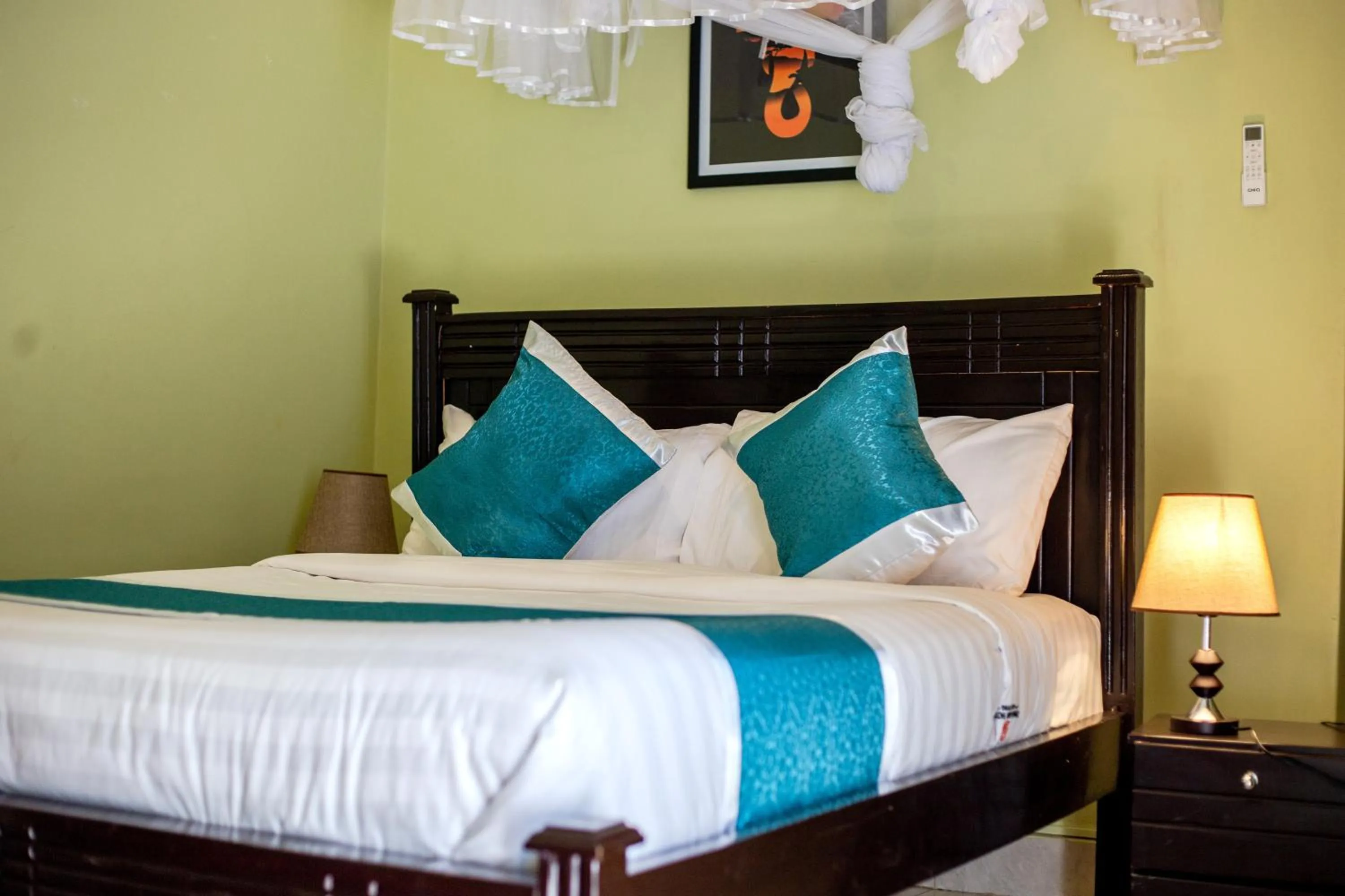 Bed in BWIRANDA HOTEL