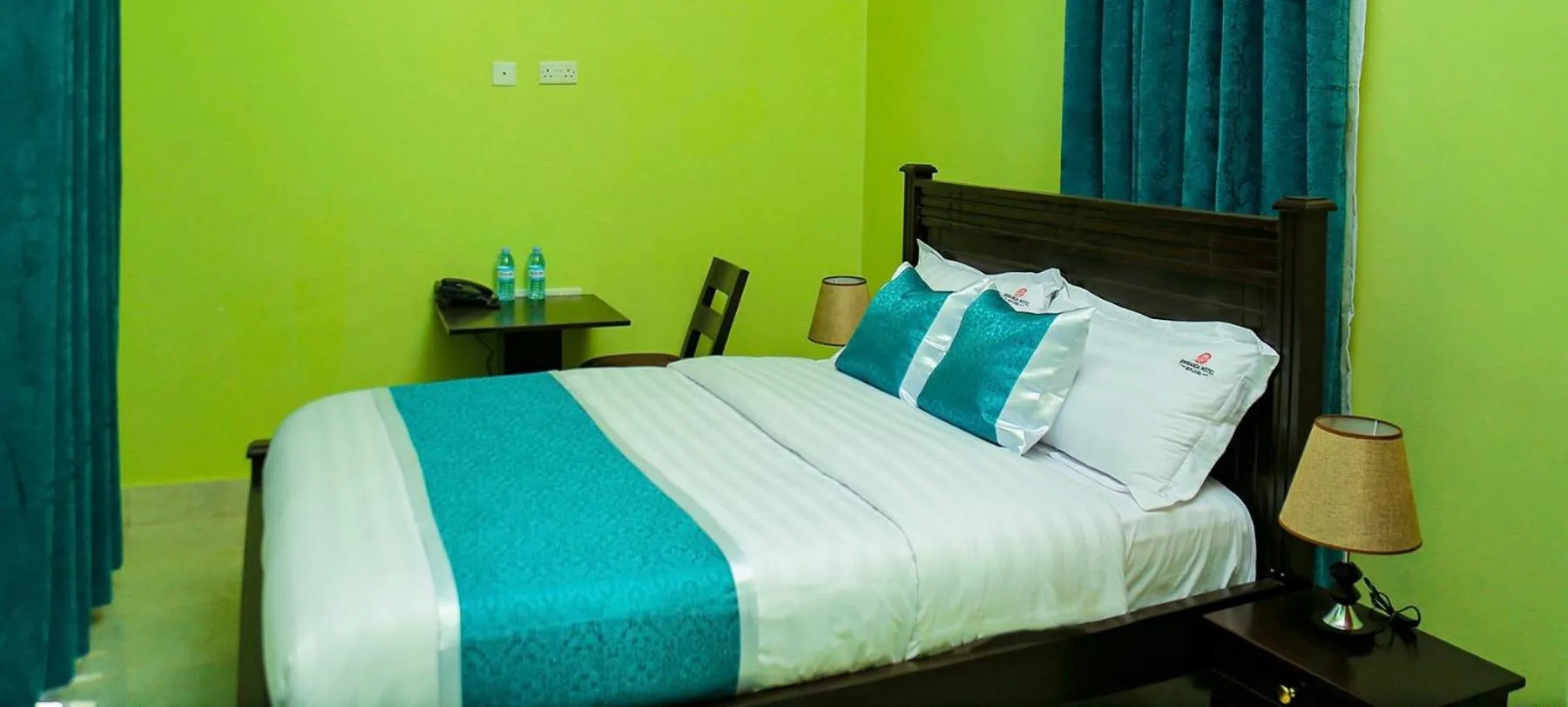 Bed in BWIRANDA HOTEL