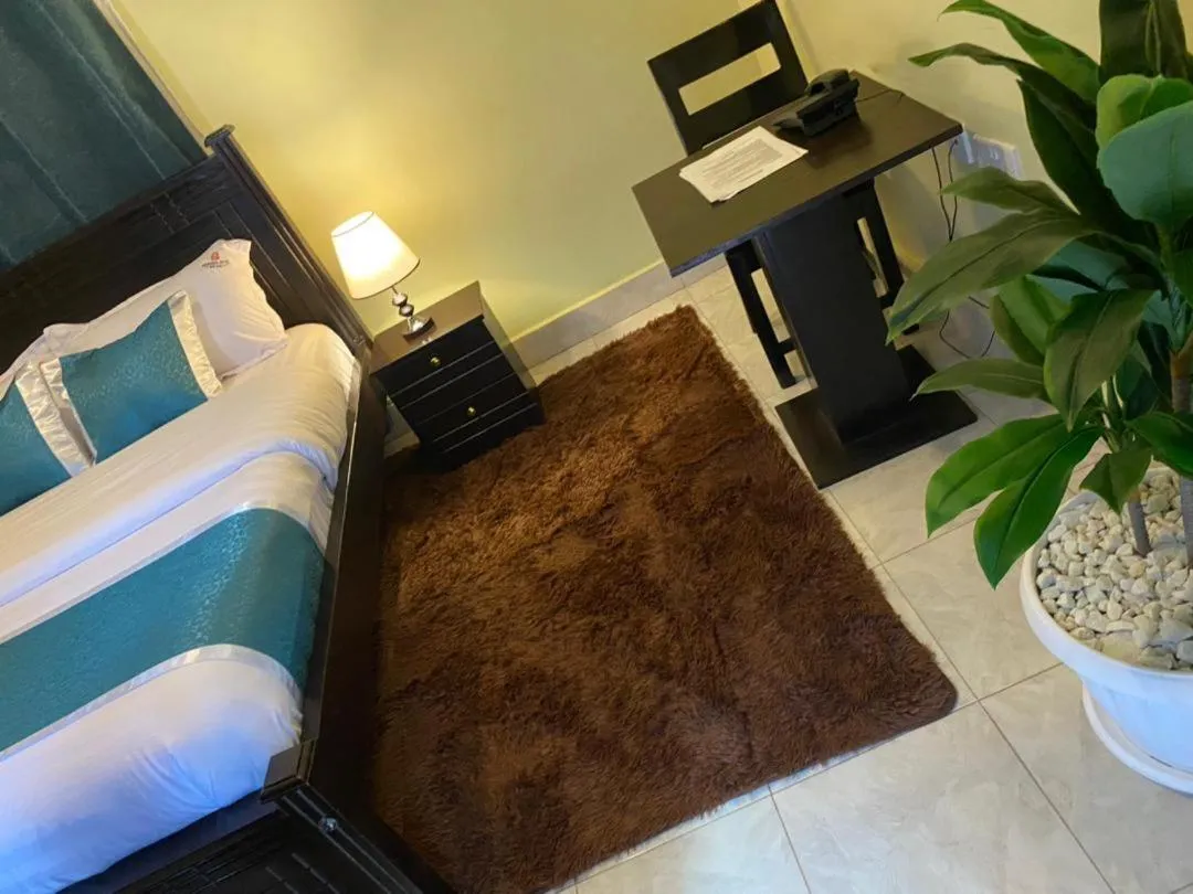 Bed in BWIRANDA HOTEL