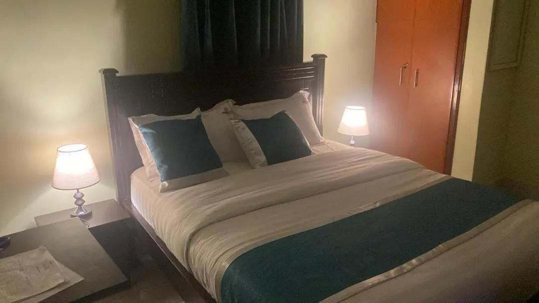Bed in BWIRANDA HOTEL