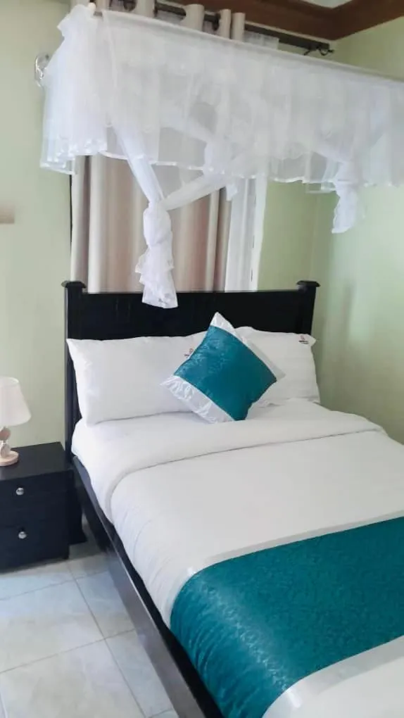 Bed in BWIRANDA HOTEL