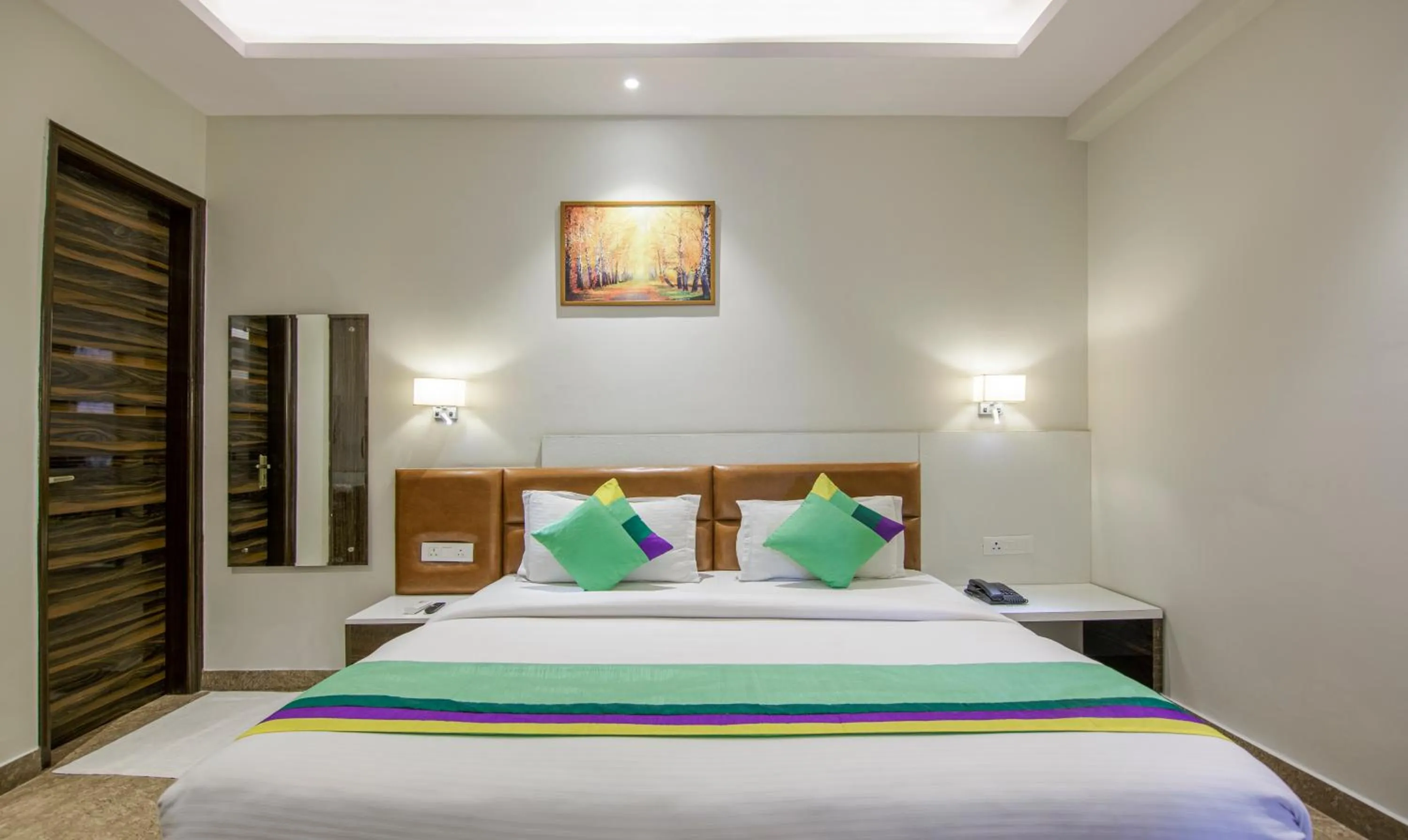 Bed in Treebo Swastika Premium