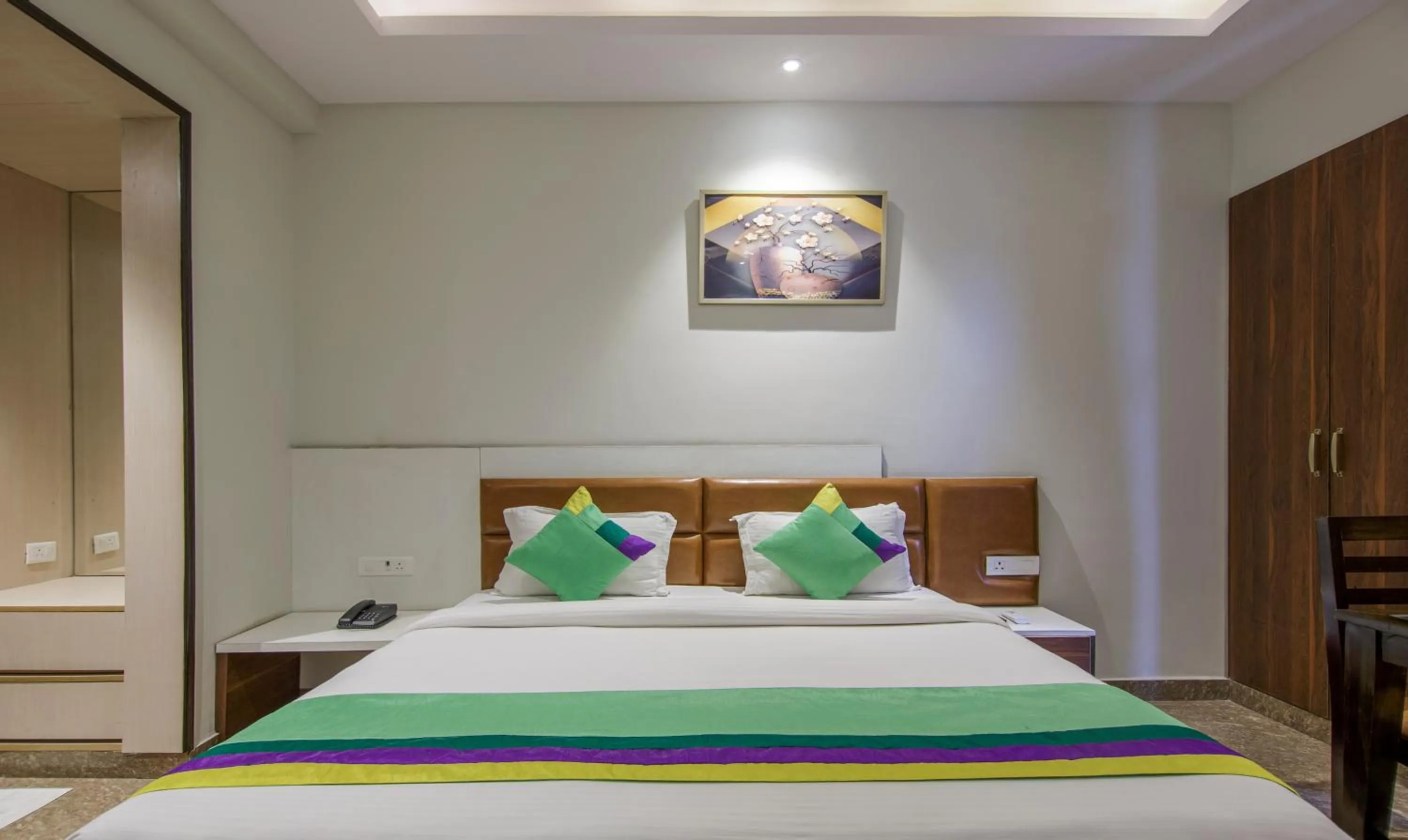 Bed in Treebo Swastika Premium