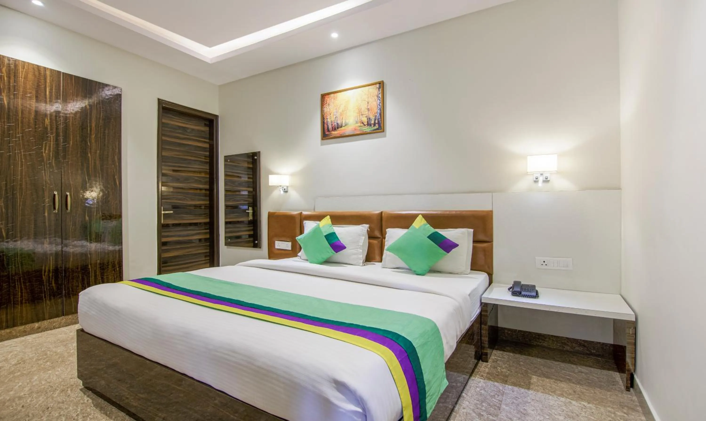 Bed in Treebo Swastika Premium