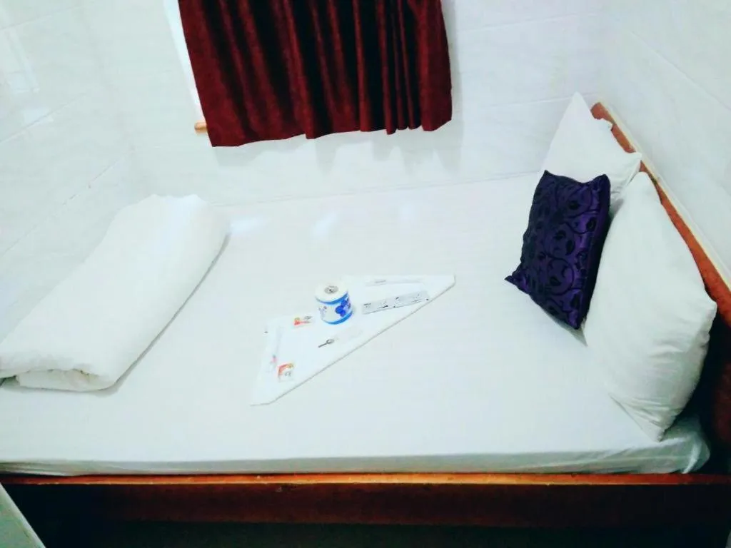 Bed in Reliance Inn