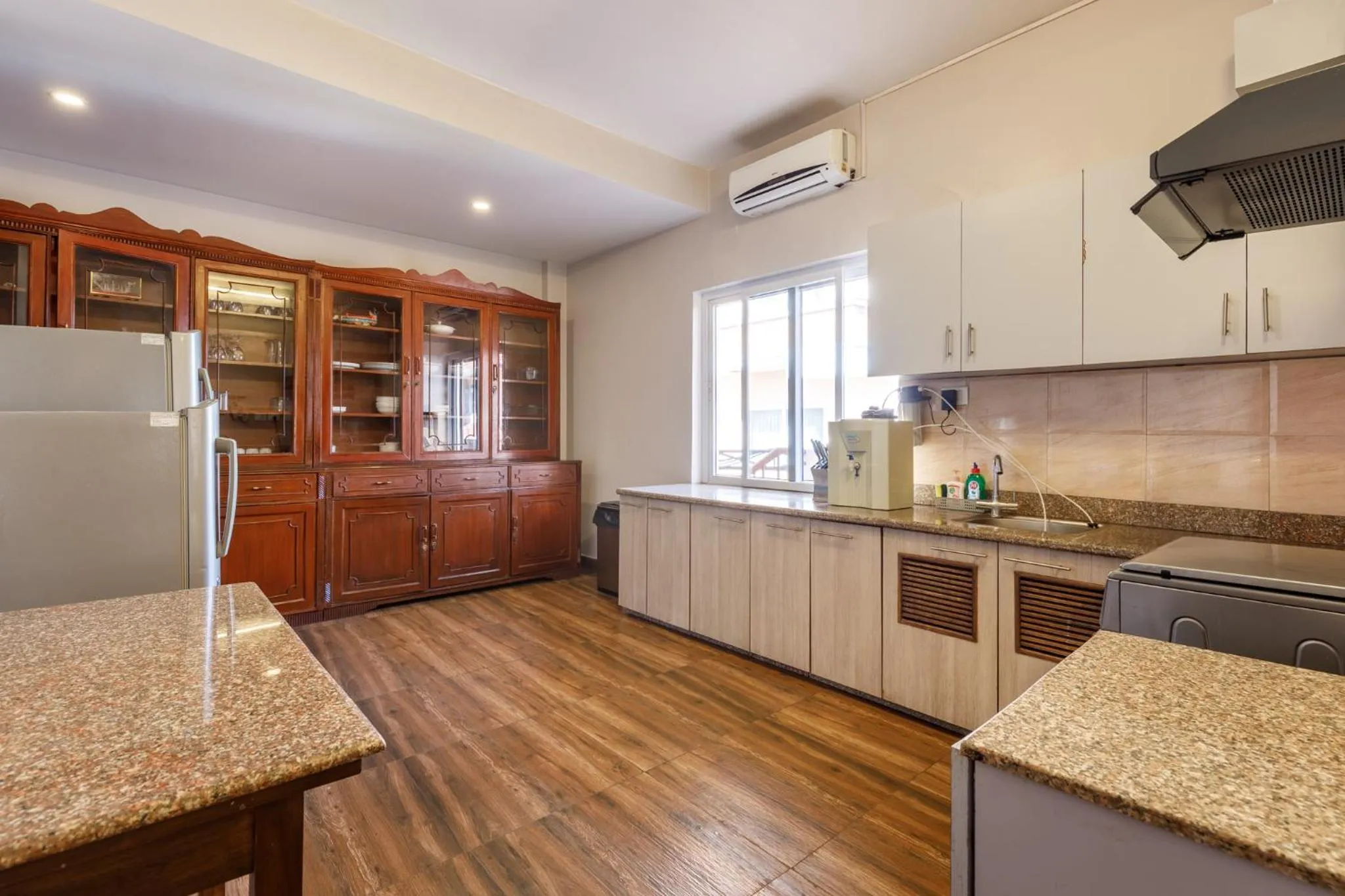 Kitchen or kitchenette in Shaligram Hotel