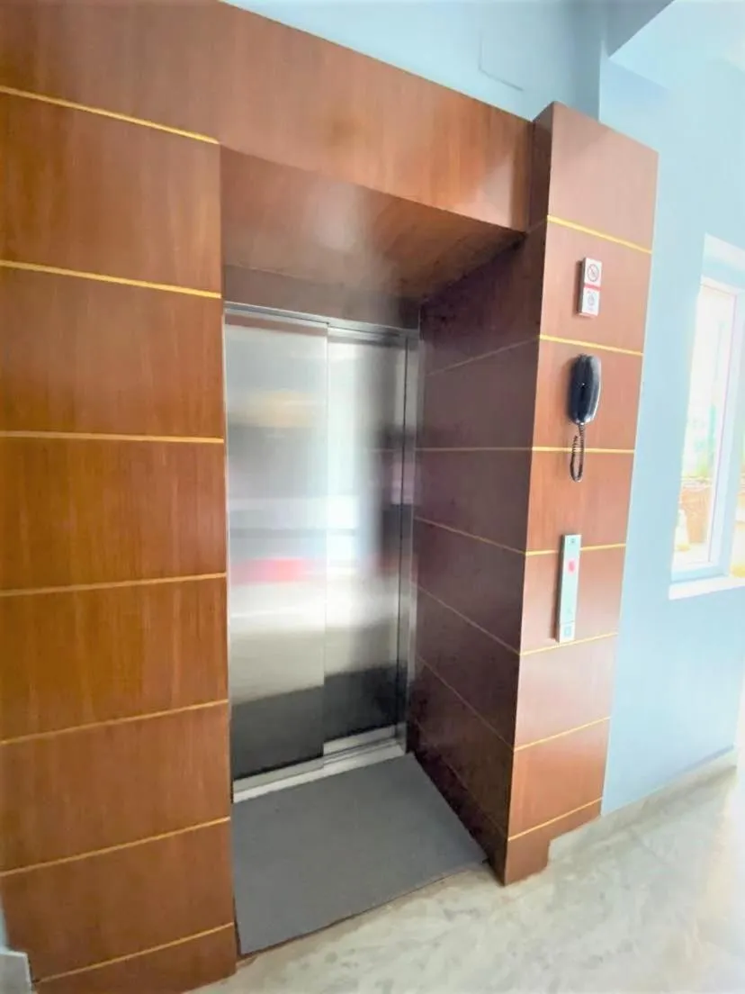 elevator in Shaligram Hotel