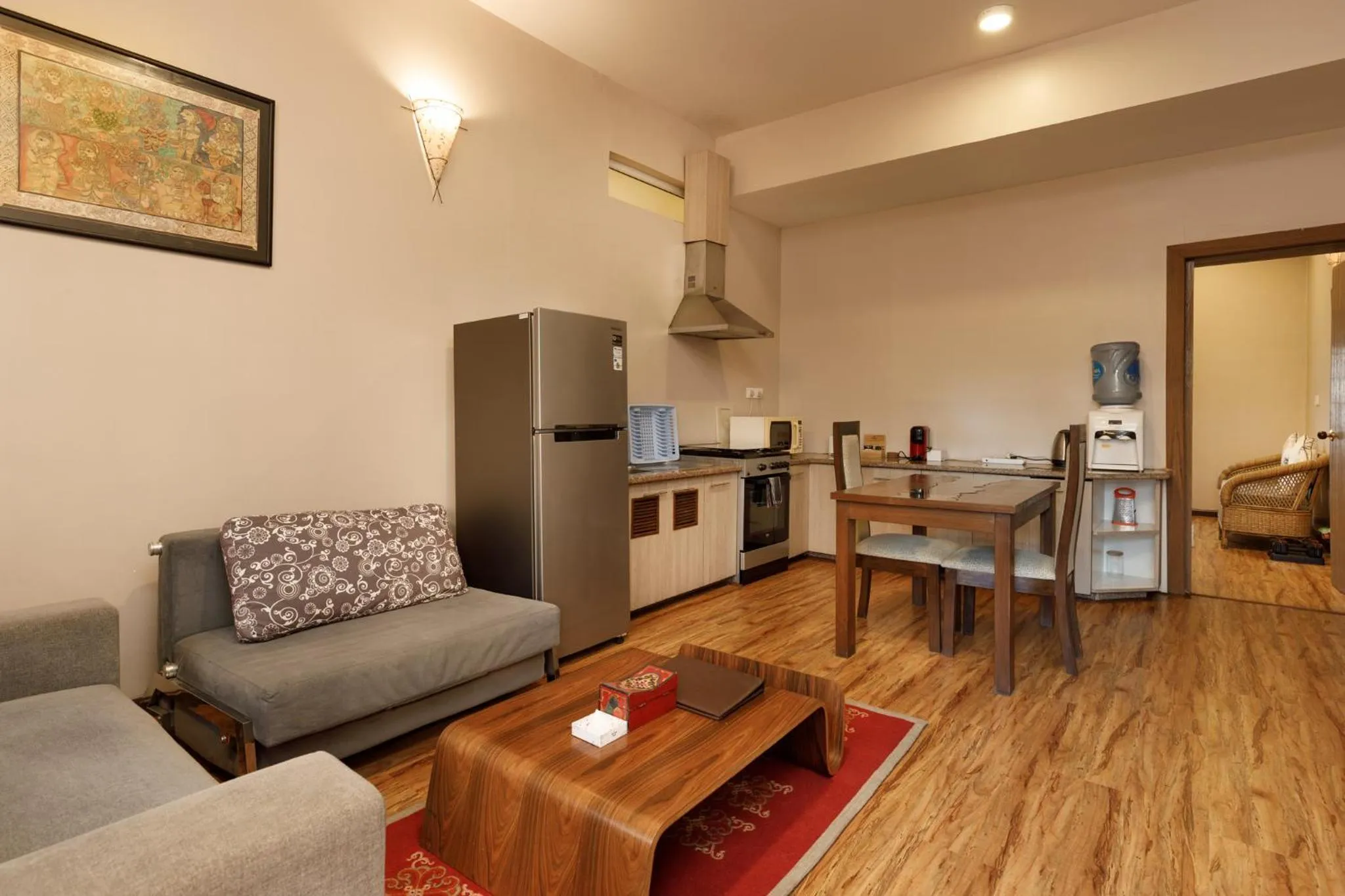 Kitchen or kitchenette in Shaligram Hotel