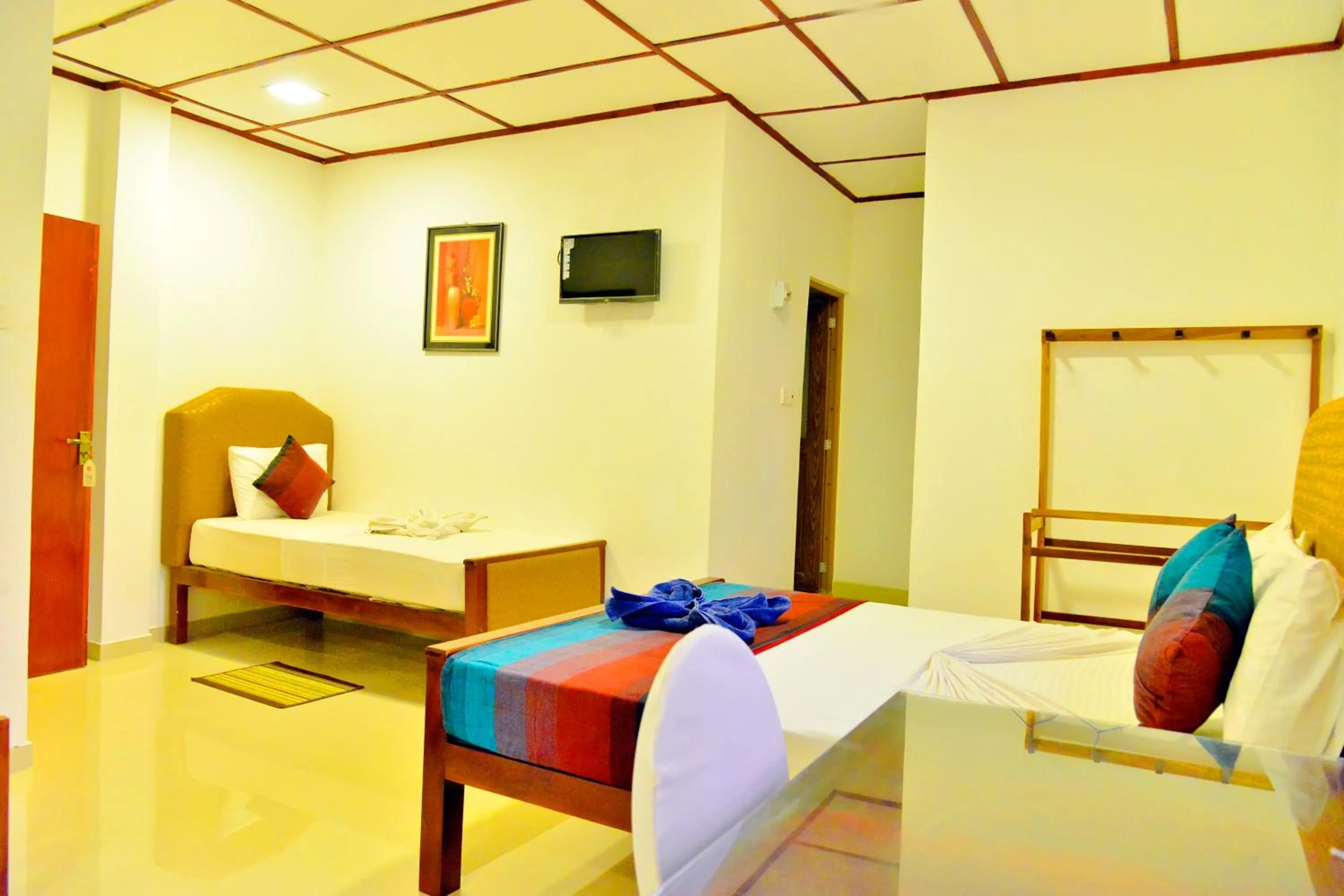 View (from property/room), Bed in Thilaka City Hotel