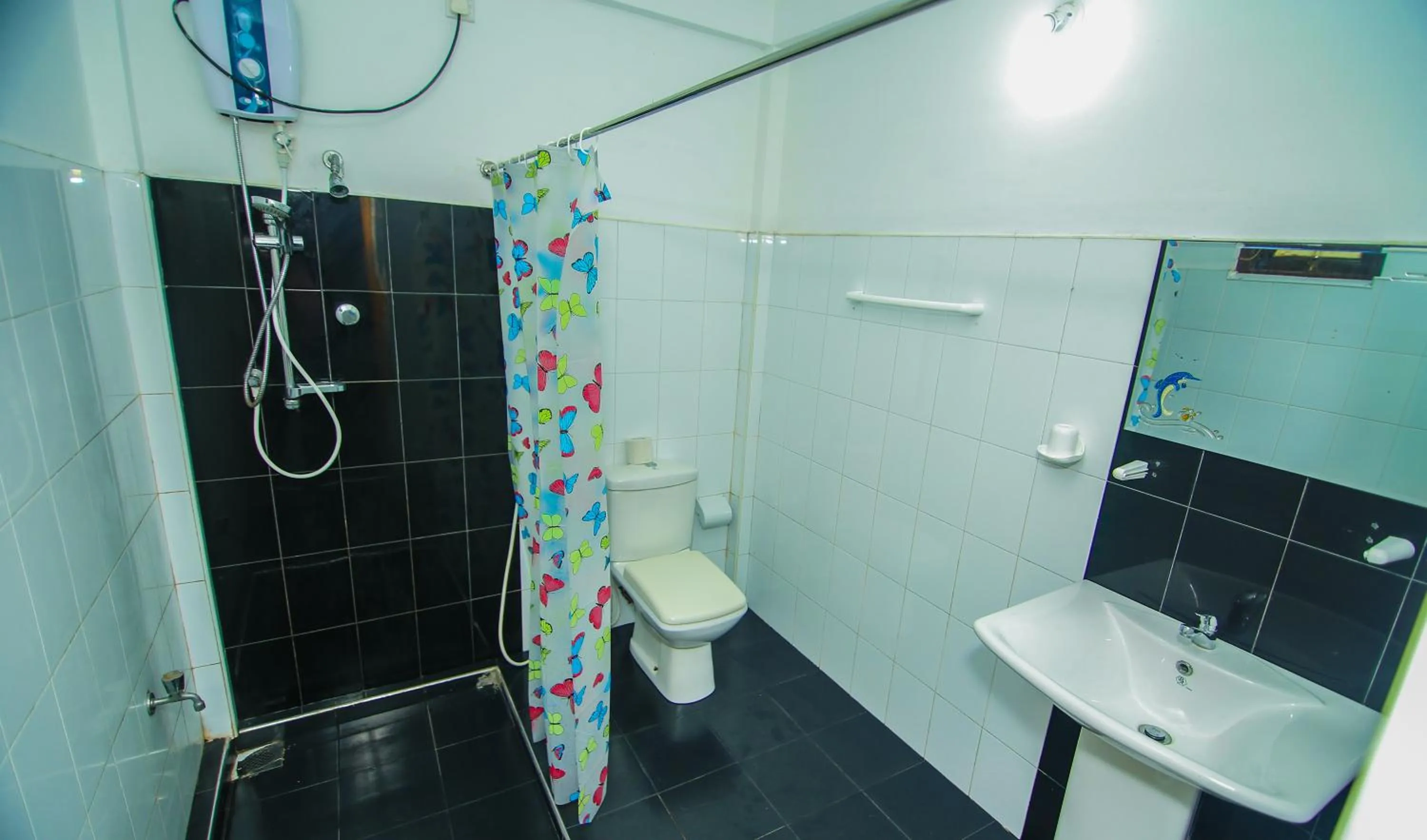 Bathroom in Thilaka City Hotel