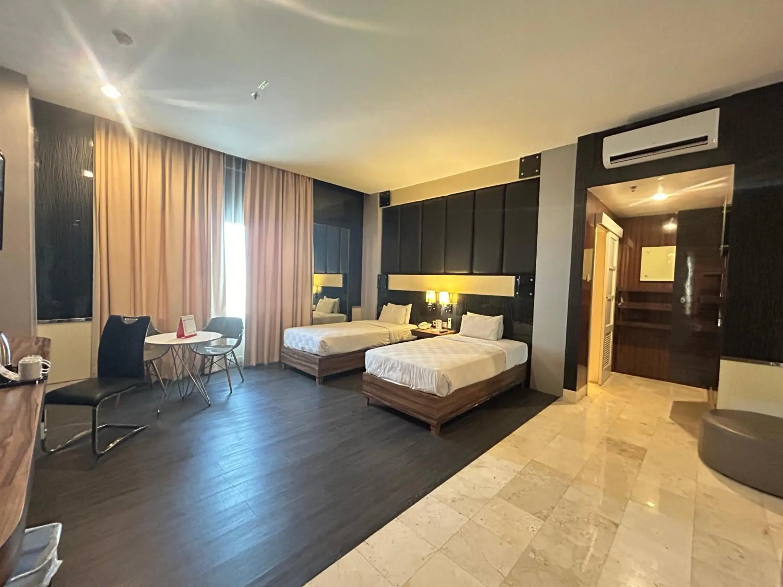 Junior Suite - Twin Room in Swiss-Belcourt Makassar Junior Suite - Twin Room in Swiss-Belcourt Makassar