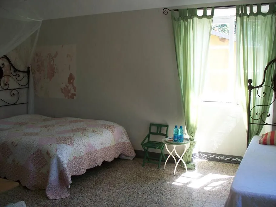 Bedroom, Bed in Casa Rosalie