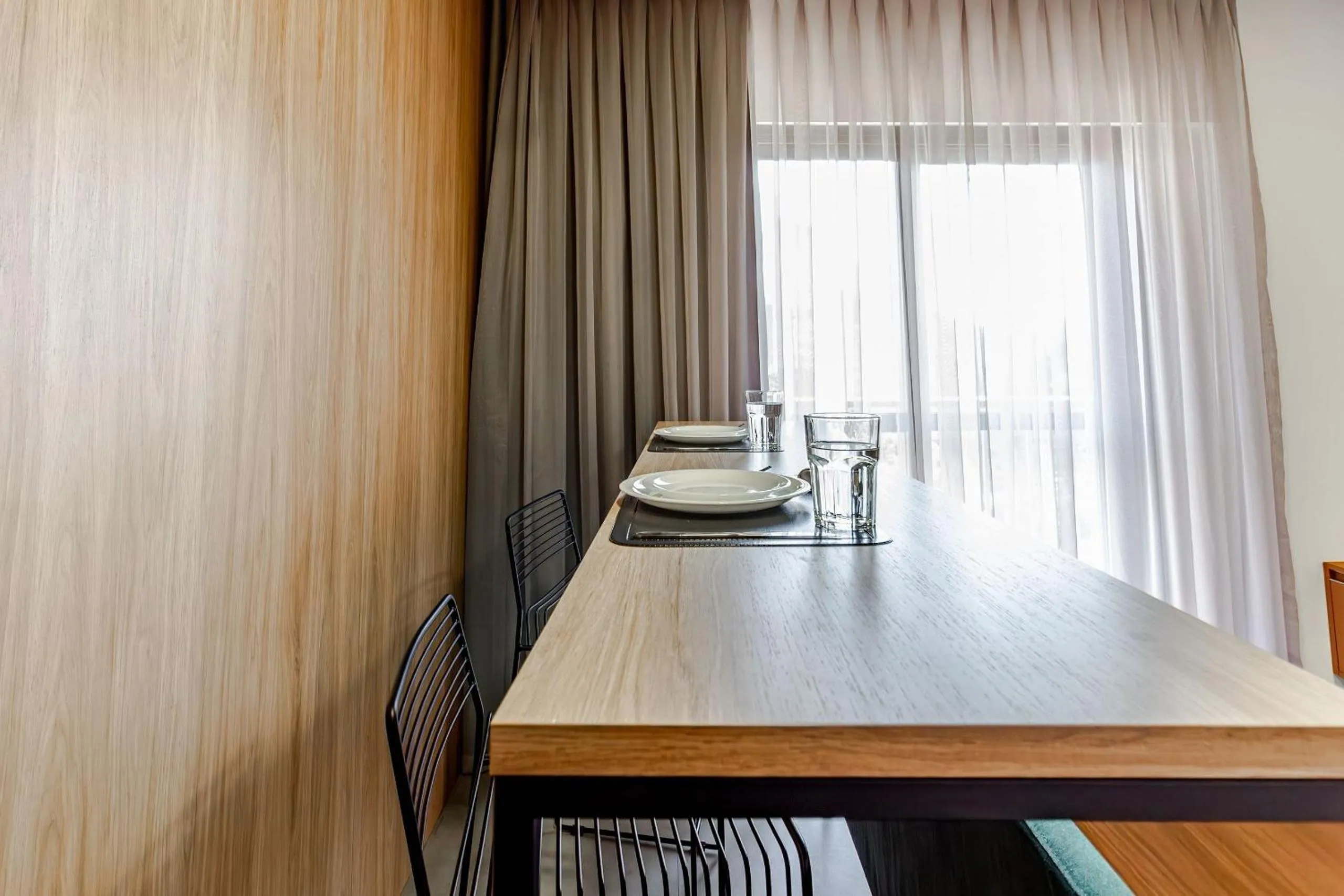 Seating area in Xtay BK30 Largo do Arouche - Estúdios aconchegantes e funcionais a 300m do metrô República