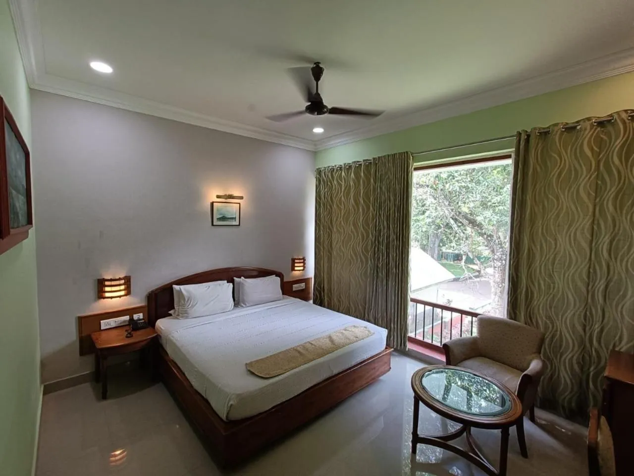 Bedroom, Bed in KTDC Aranya Nivas
