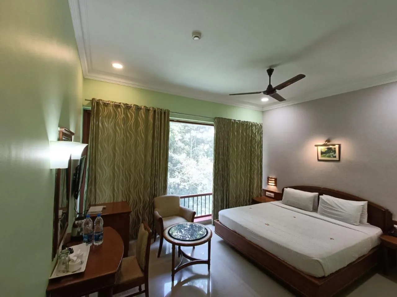 Bedroom, Bed in KTDC Aranya Nivas