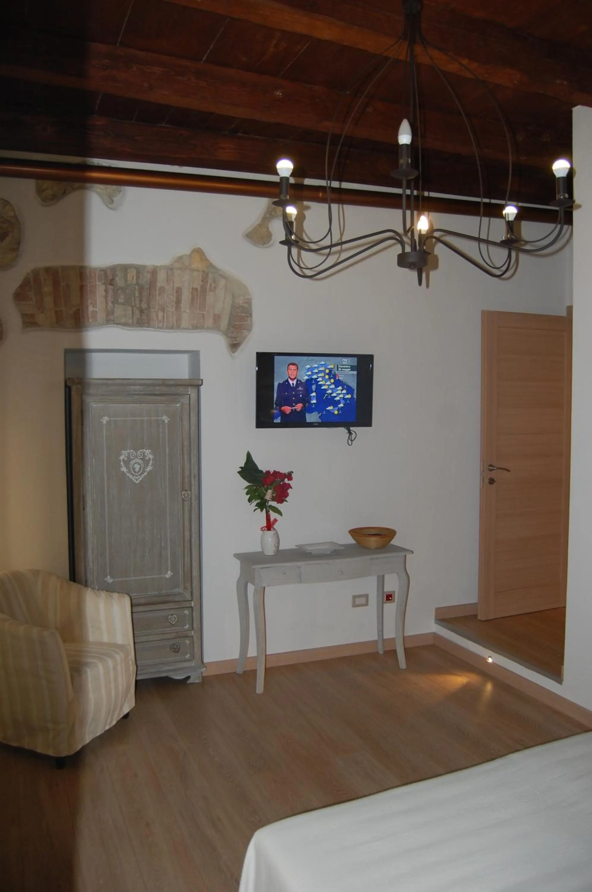 Seating area, Bed in Archè