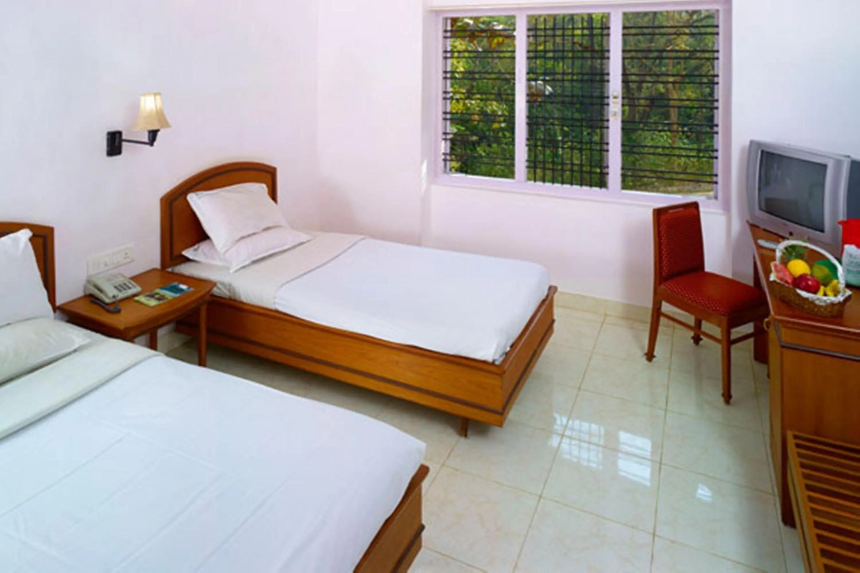 Bed in KTDC Periyar House