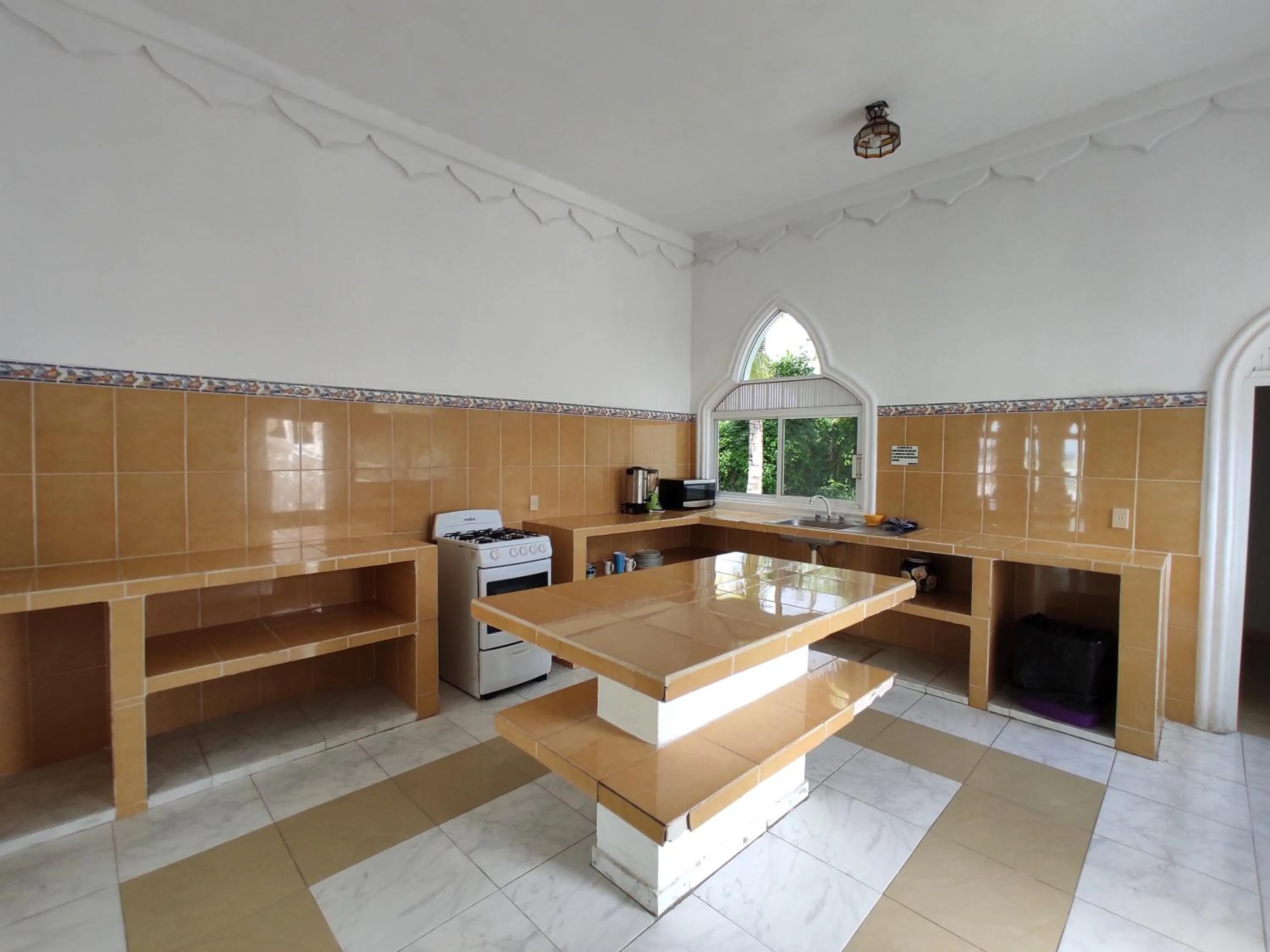 Kitchen or kitchenette in Villas Paradise