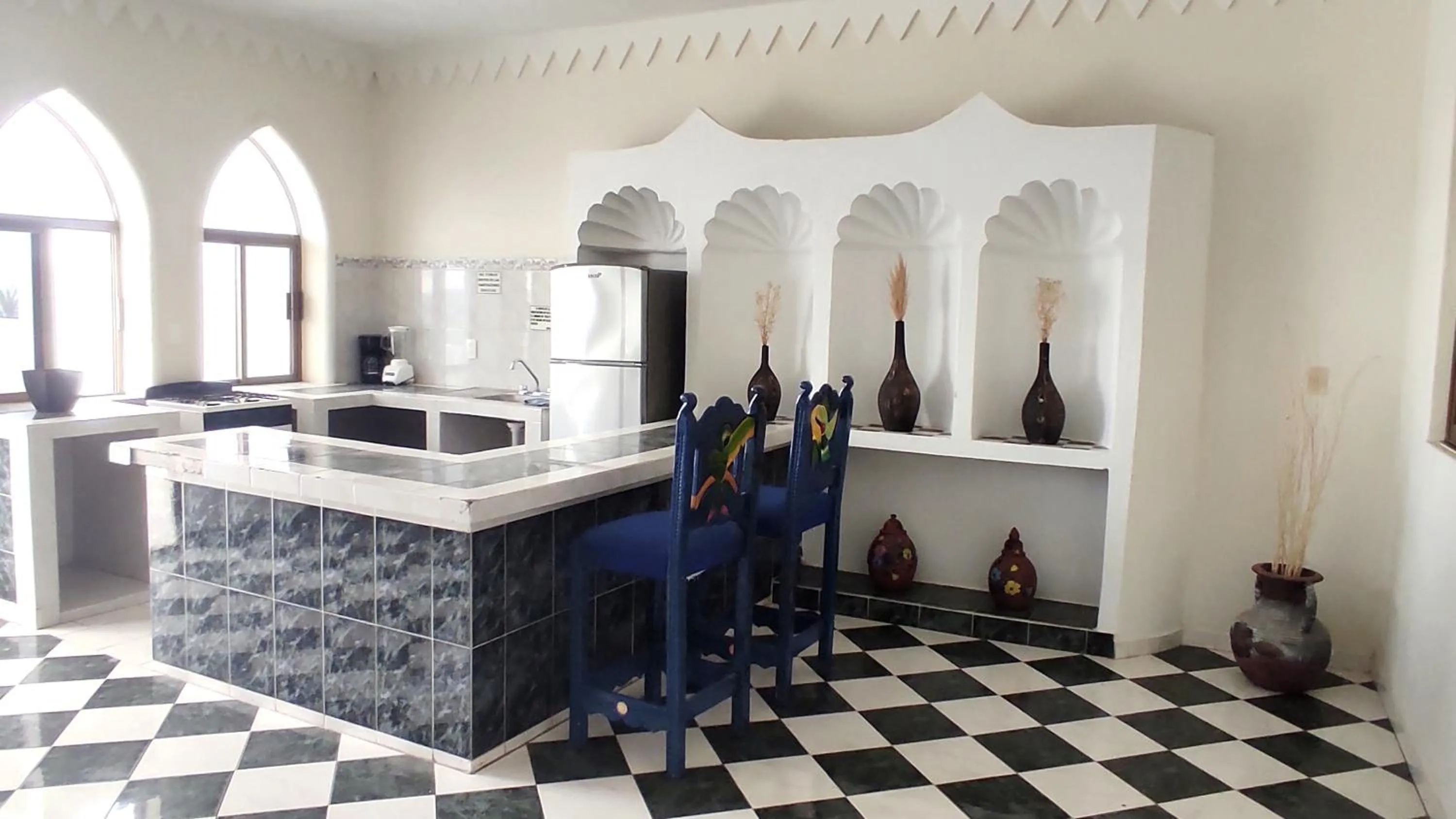 Kitchen or kitchenette in Villas Paradise
