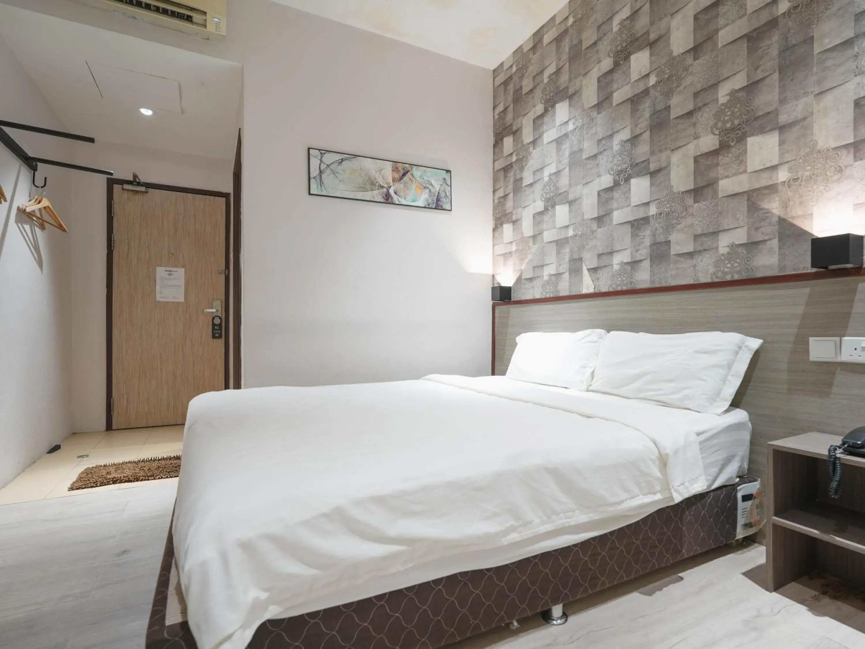 Bed in The Noble Hotel Bed in The Noble Hotel