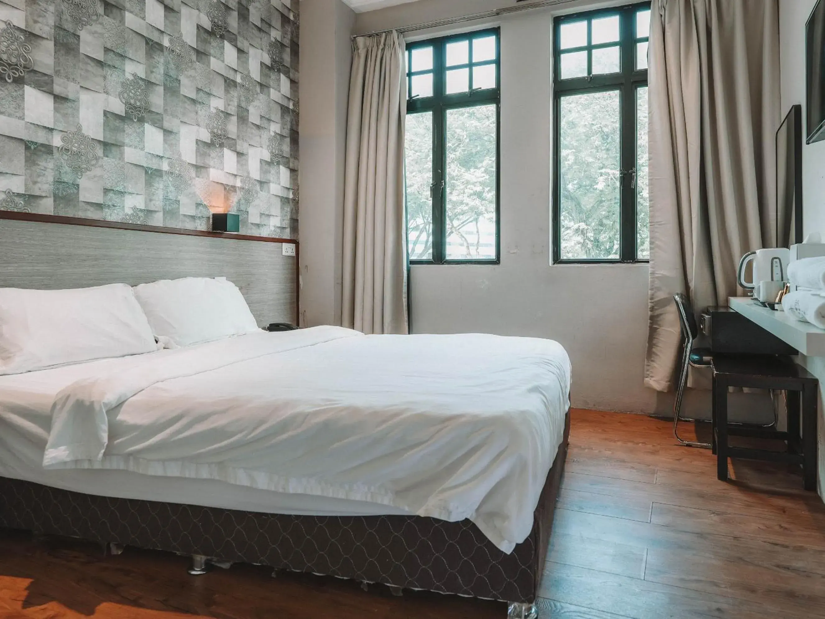 Bed in The Noble Hotel Bed in The Noble Hotel