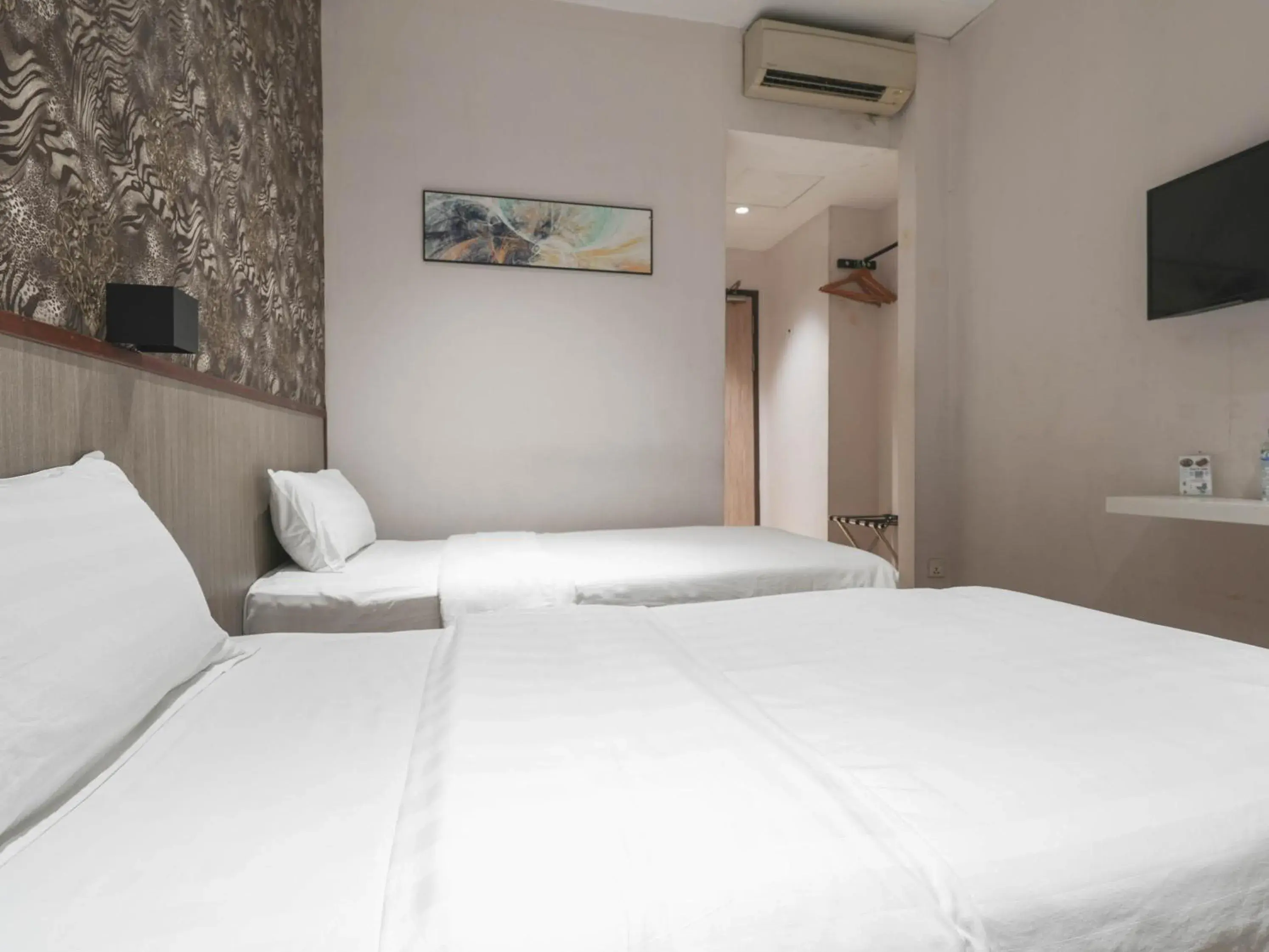 Bed in The Noble Hotel Bed in The Noble Hotel