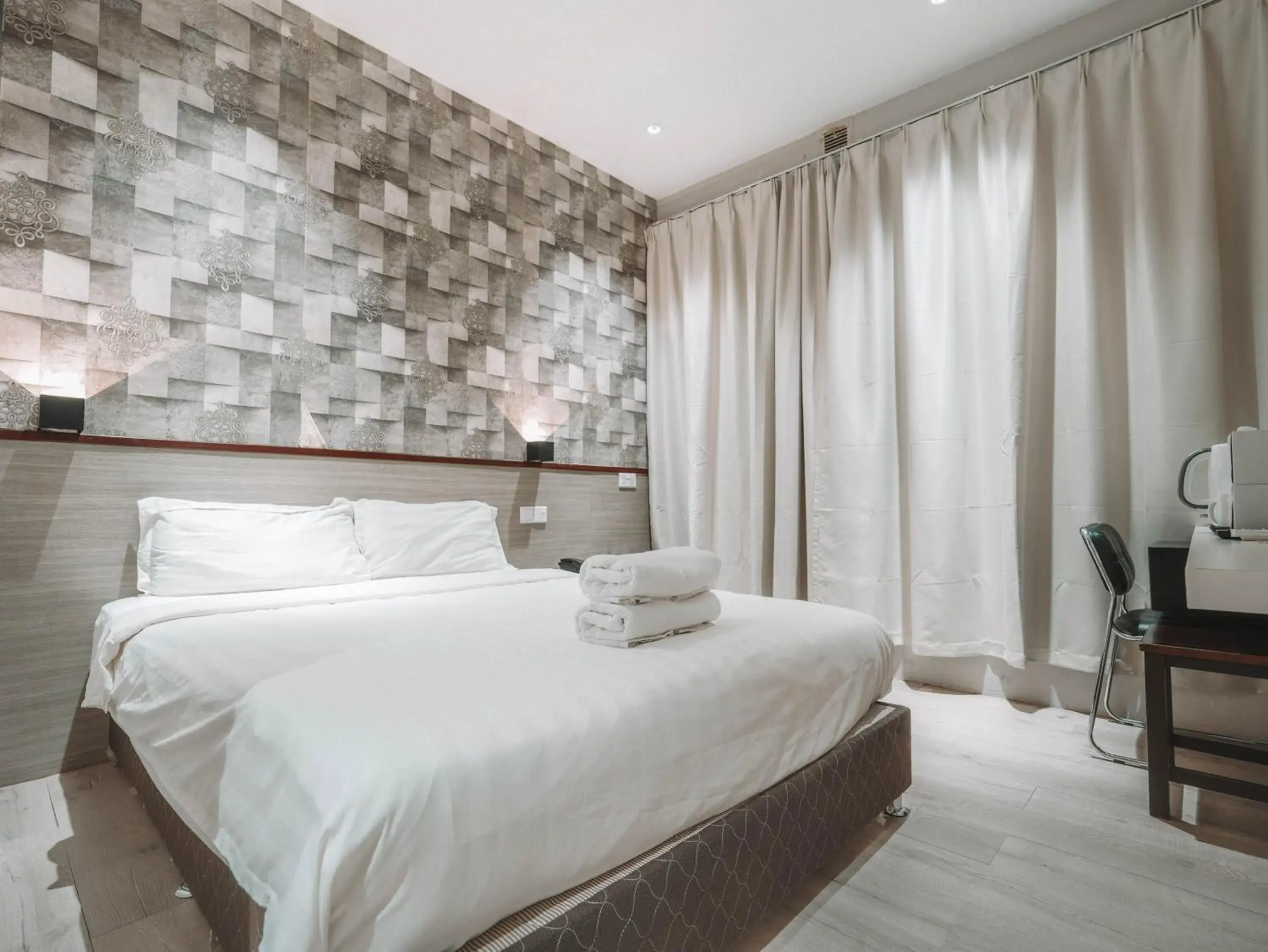 Bed in The Noble Hotel Bed in The Noble Hotel