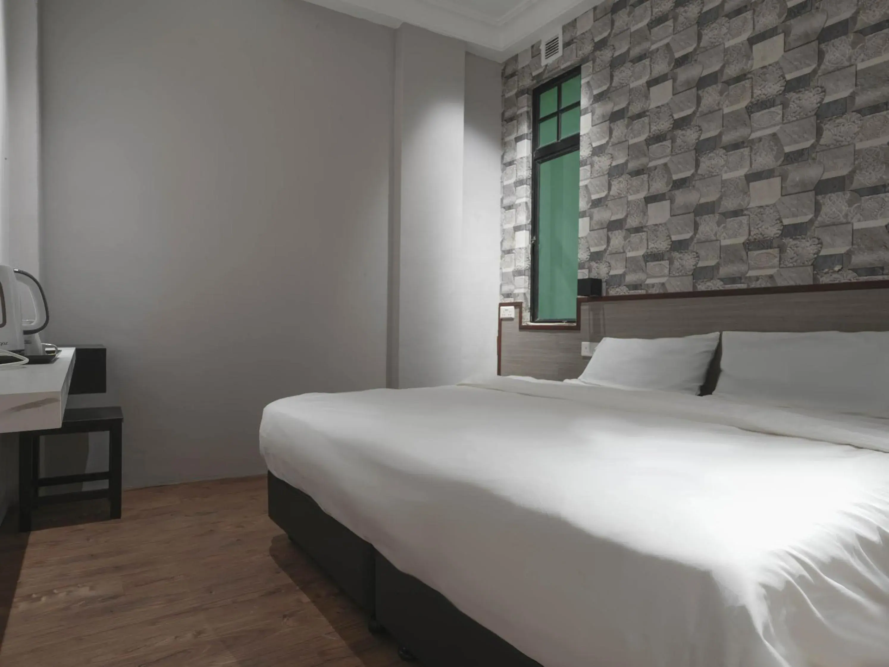 Bed in The Noble Hotel Bed in The Noble Hotel