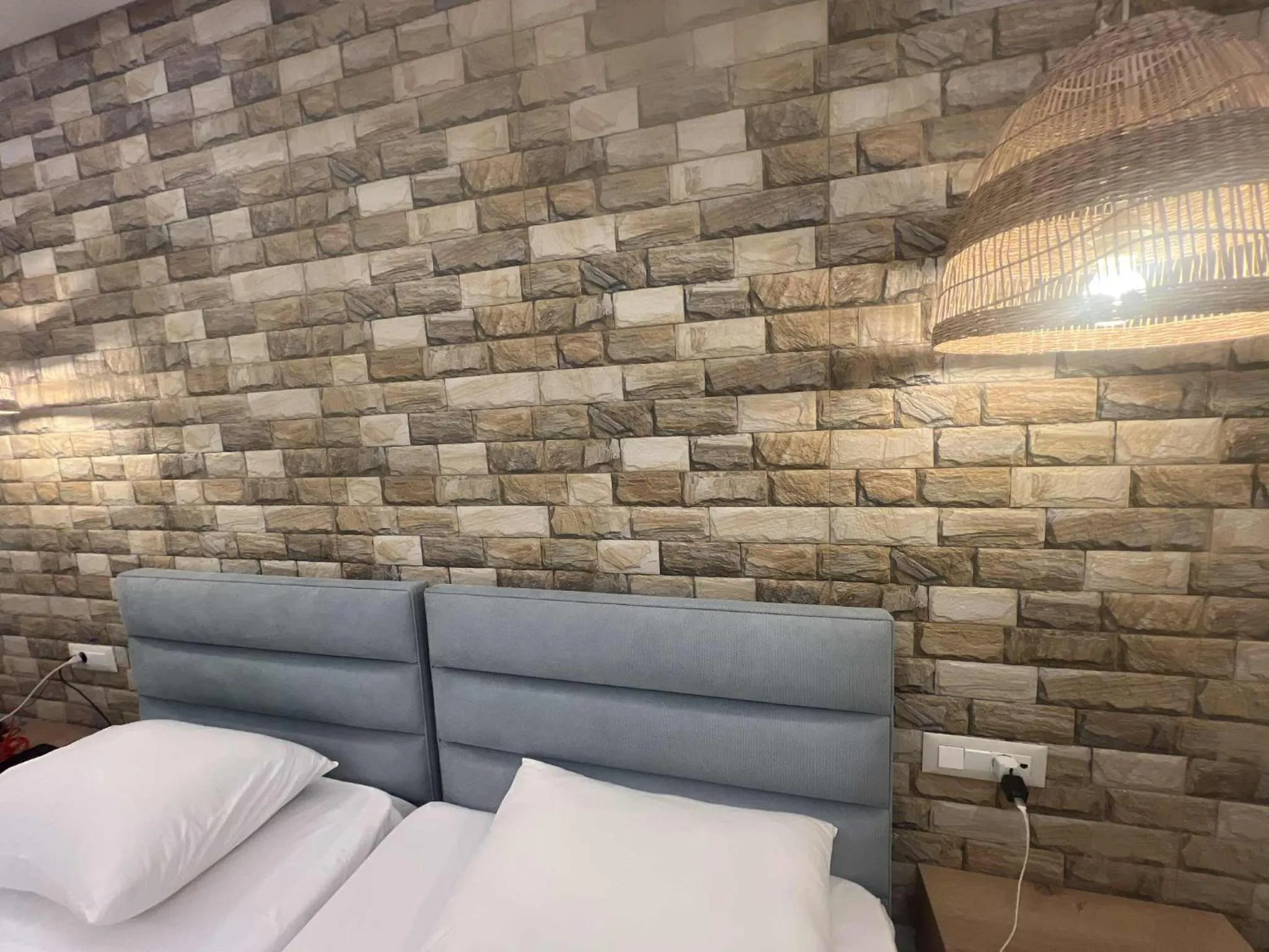 Bed in Dolphin Hotel Apartments