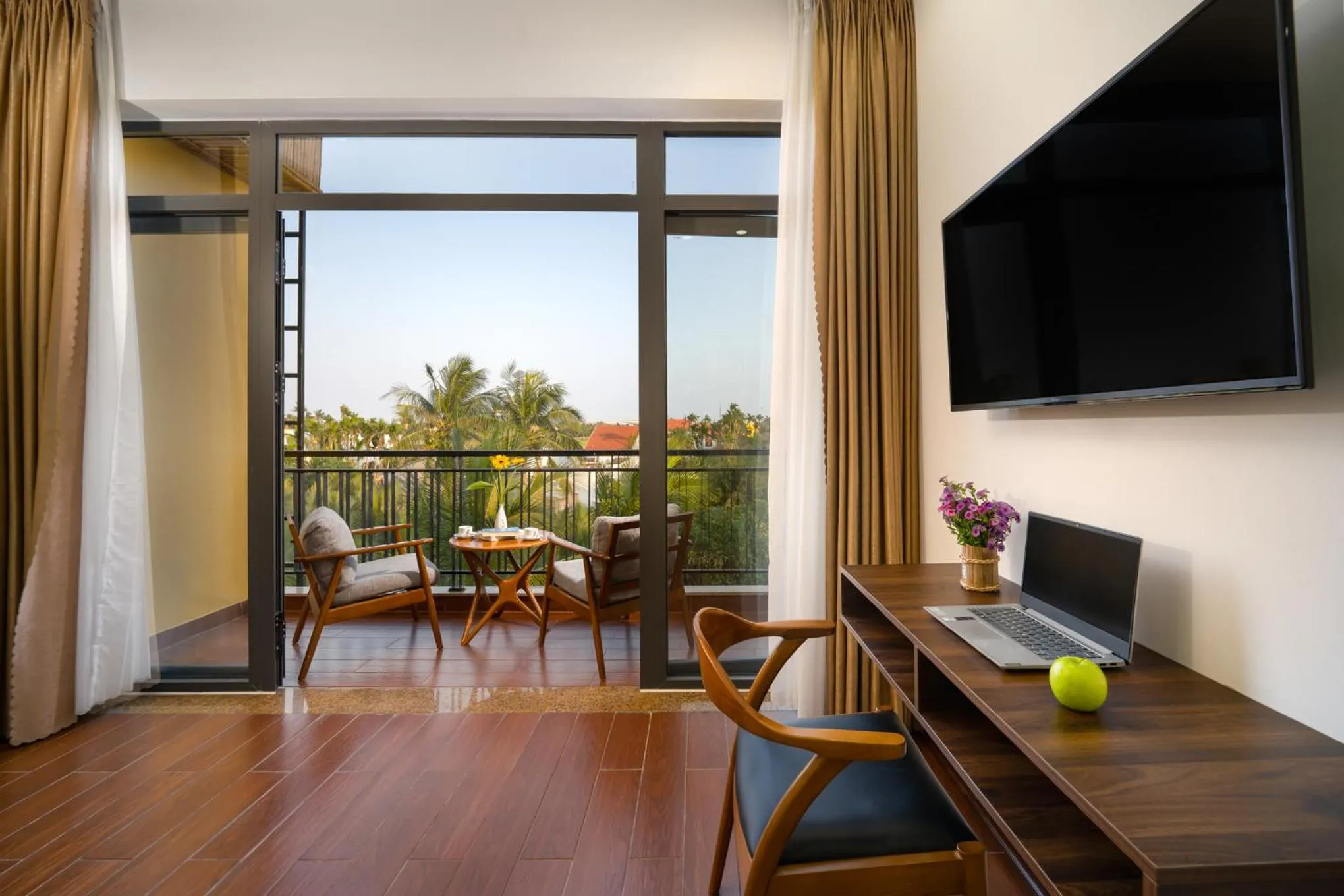 Communal lounge/ TV room in Lancelynk Retreat Hoi An