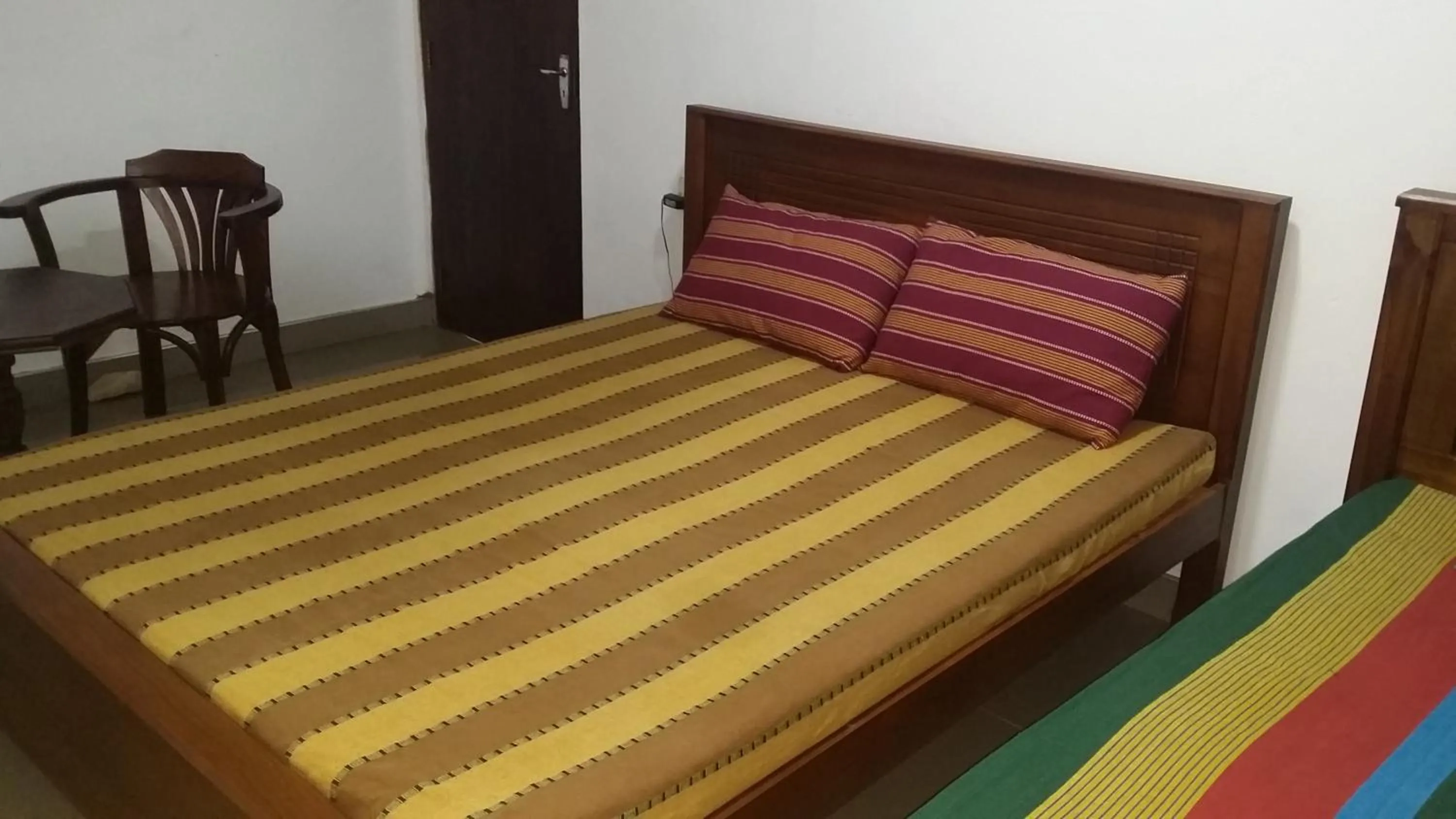 Bed in Polhena Coral Reef Resort