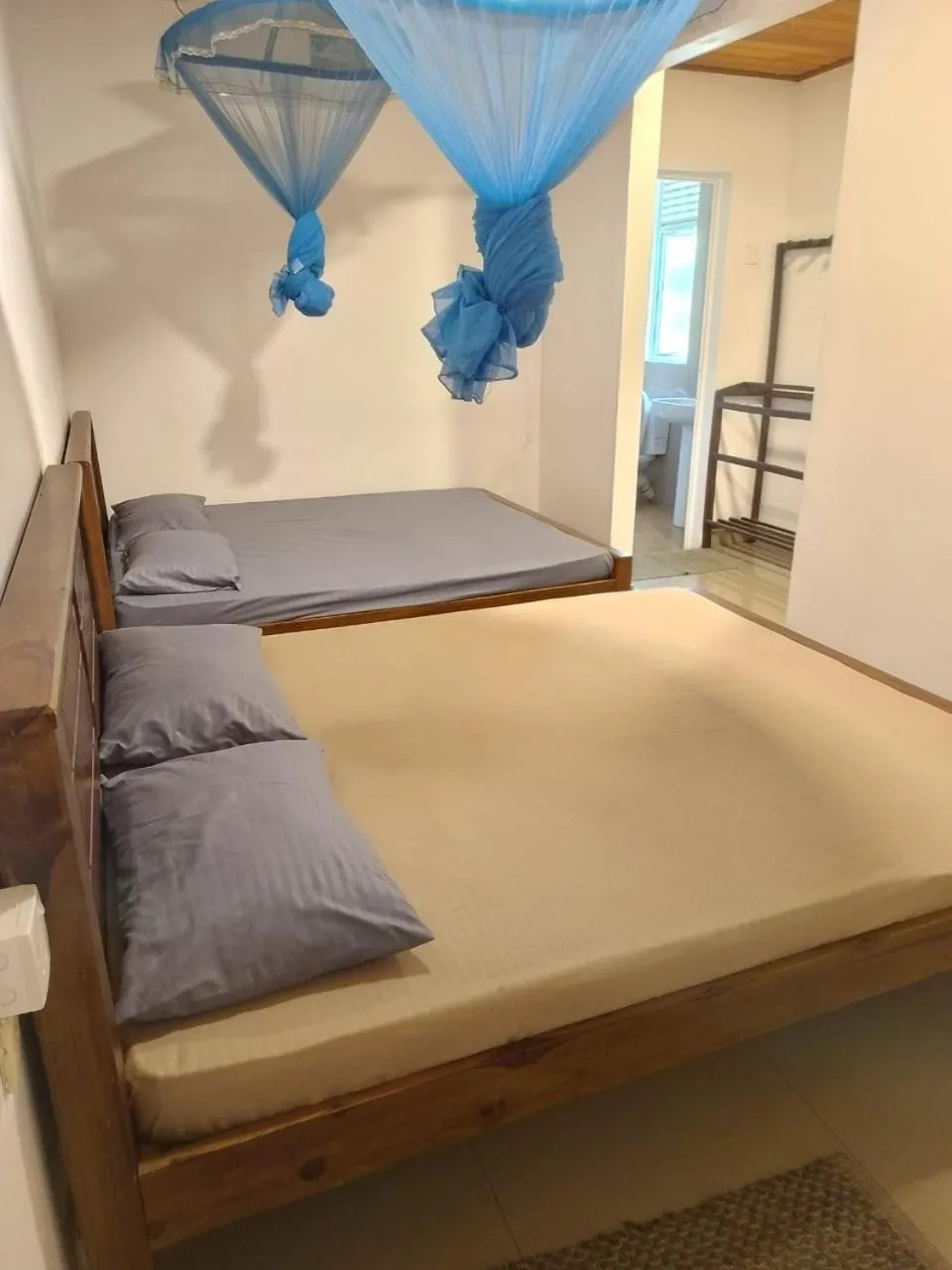 Bed in Polhena Coral Reef Resort