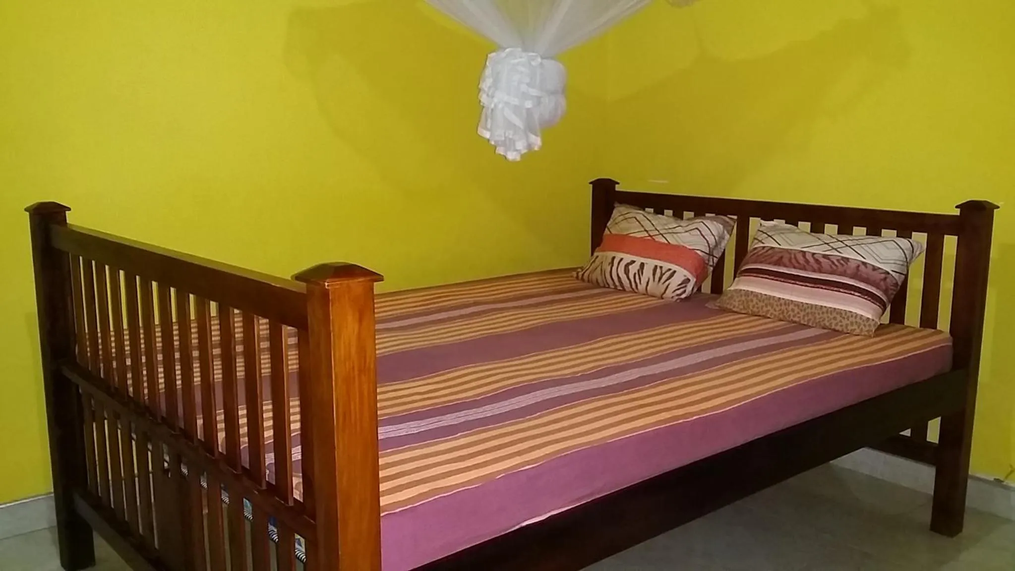 Bed in Polhena Coral Reef Resort