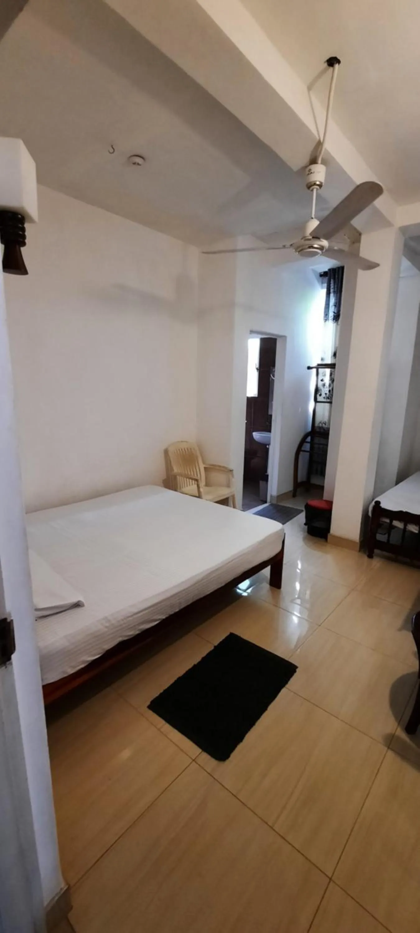 Bed in Polhena Coral Reef Resort