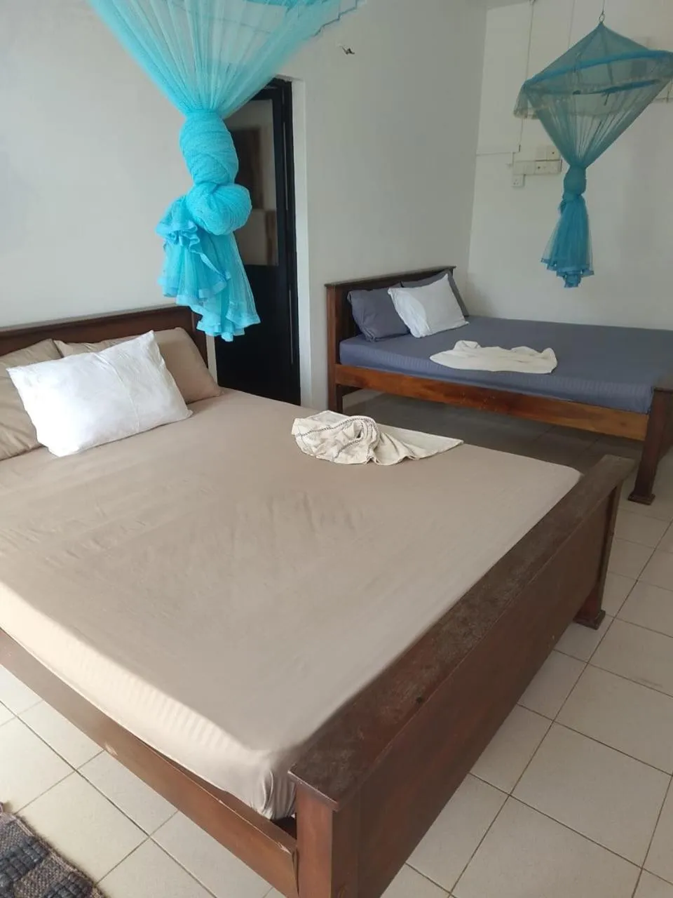 Bed in Polhena Coral Reef Resort