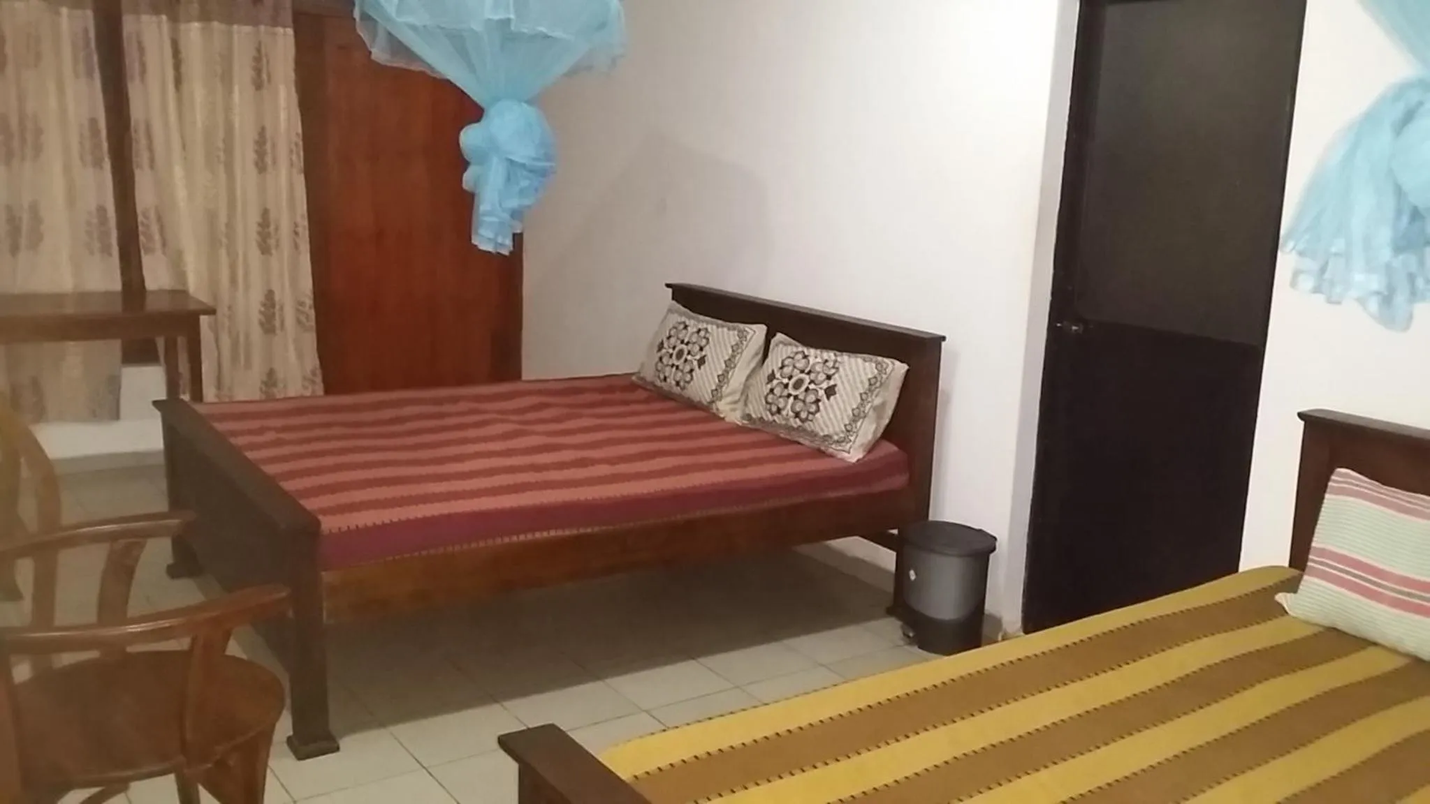 Bed in Polhena Coral Reef Resort