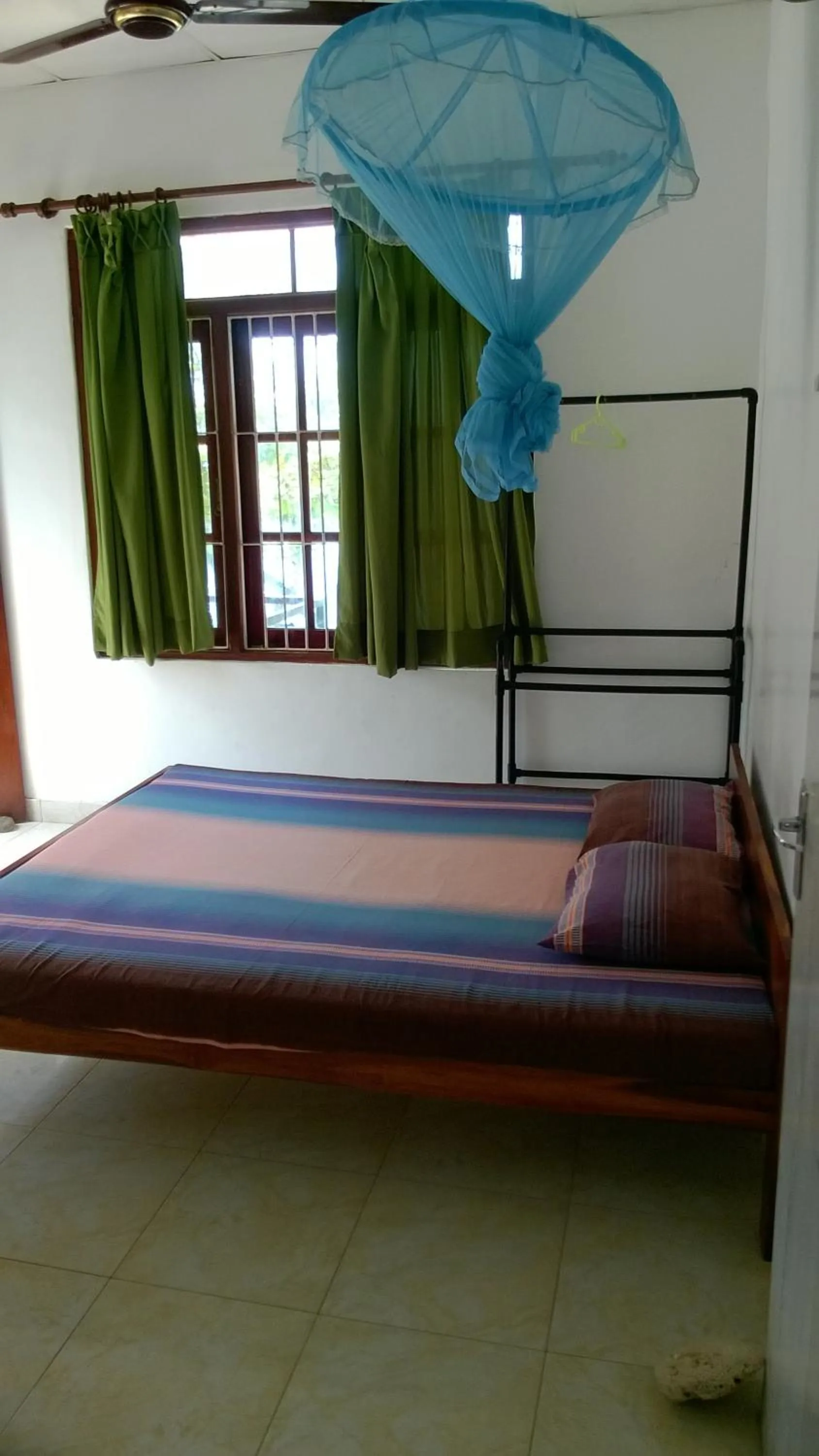 Bed in Polhena Coral Reef Resort