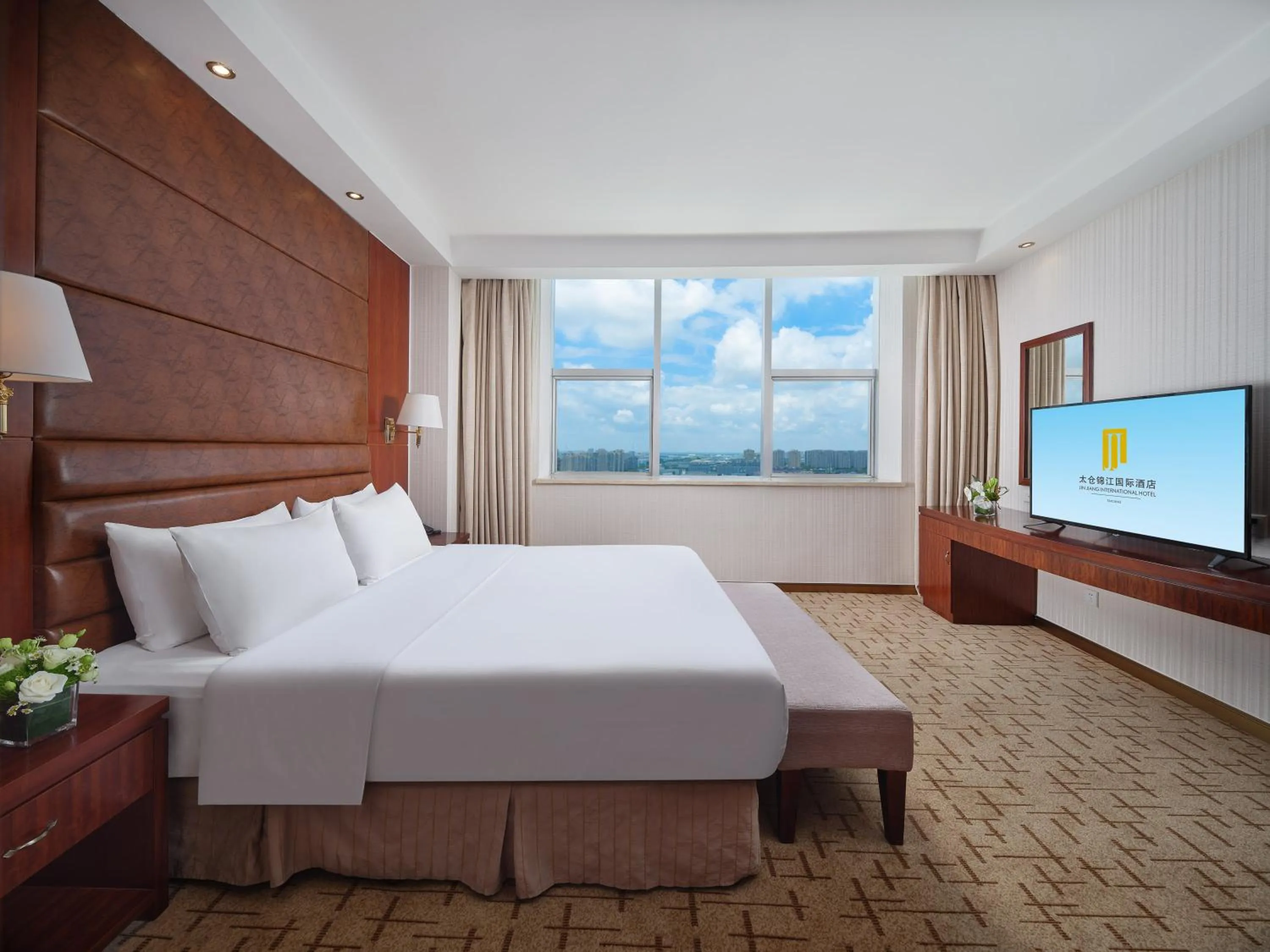 Bed in Jin Jiang International Hotel Taicang