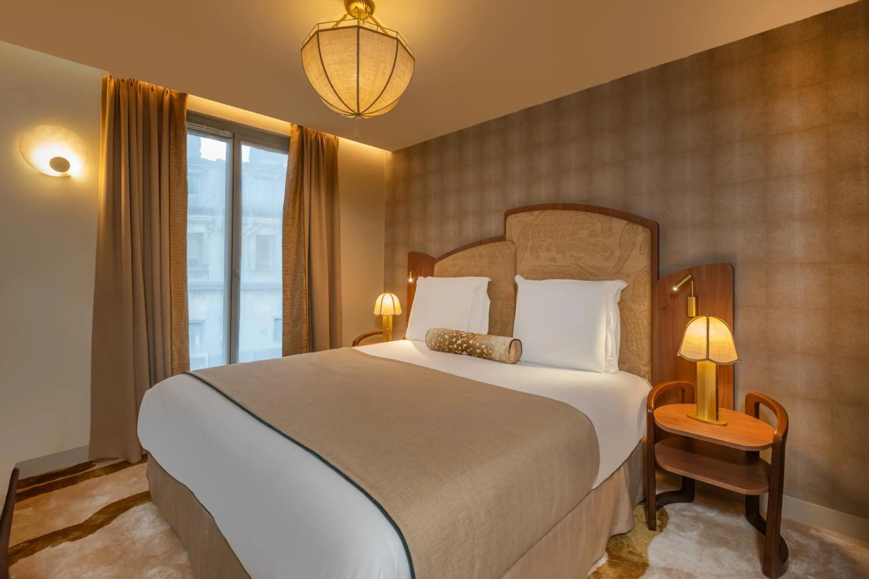 Bed in Hôtel La Bourdonnais by Inwood Hotels