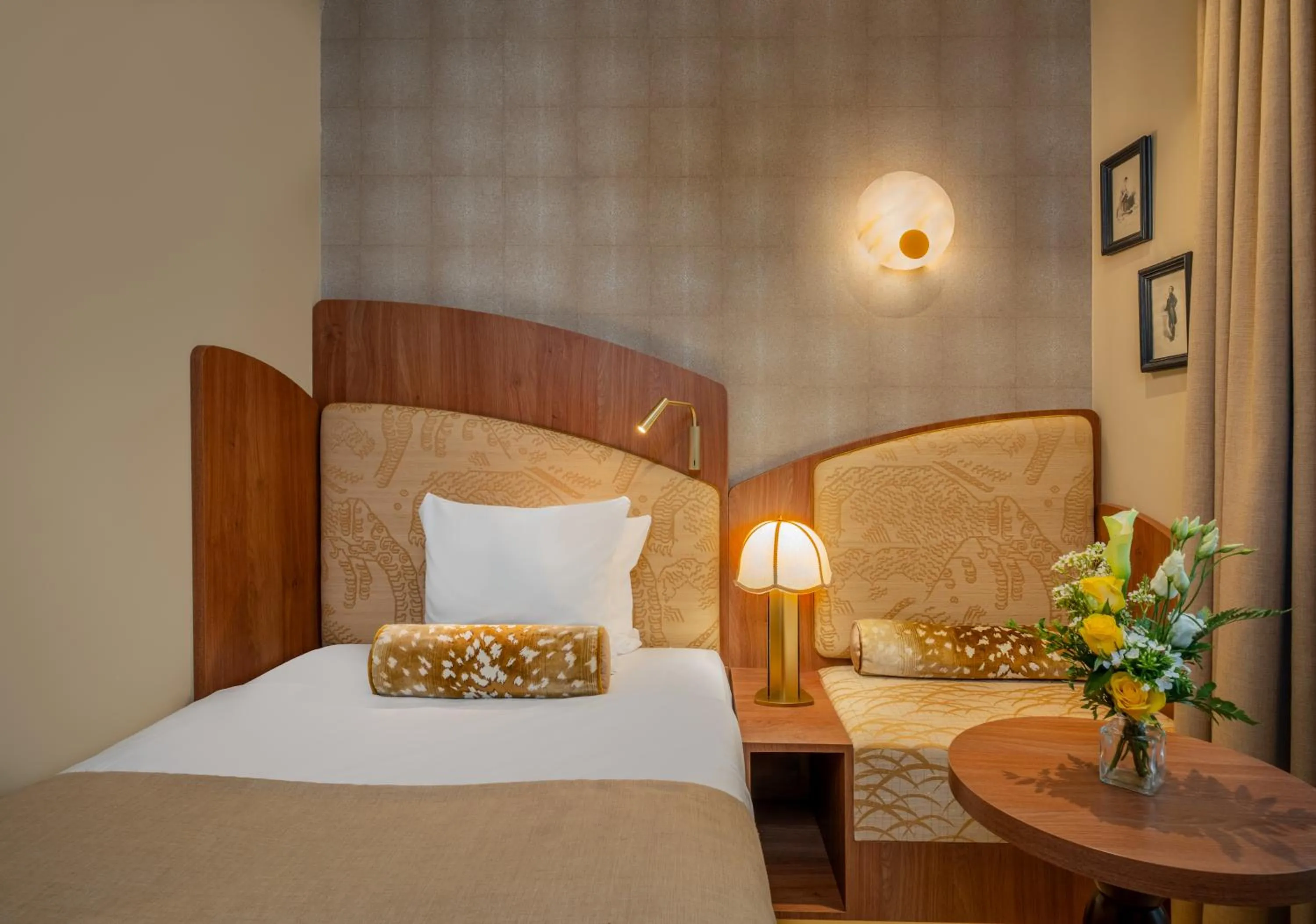 Bed in Hôtel La Bourdonnais by Inwood Hotels