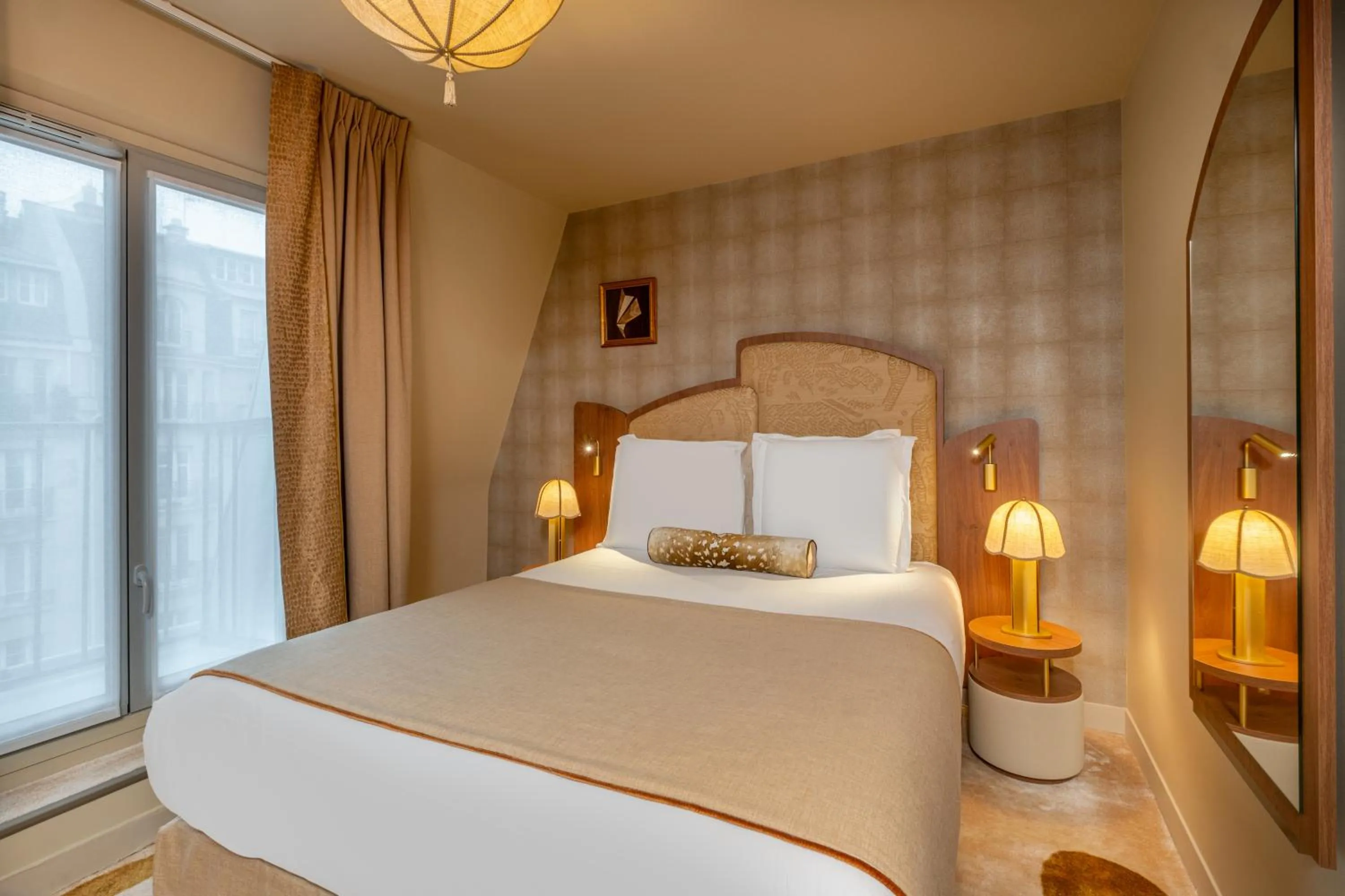Bed in Hôtel La Bourdonnais by Inwood Hotels