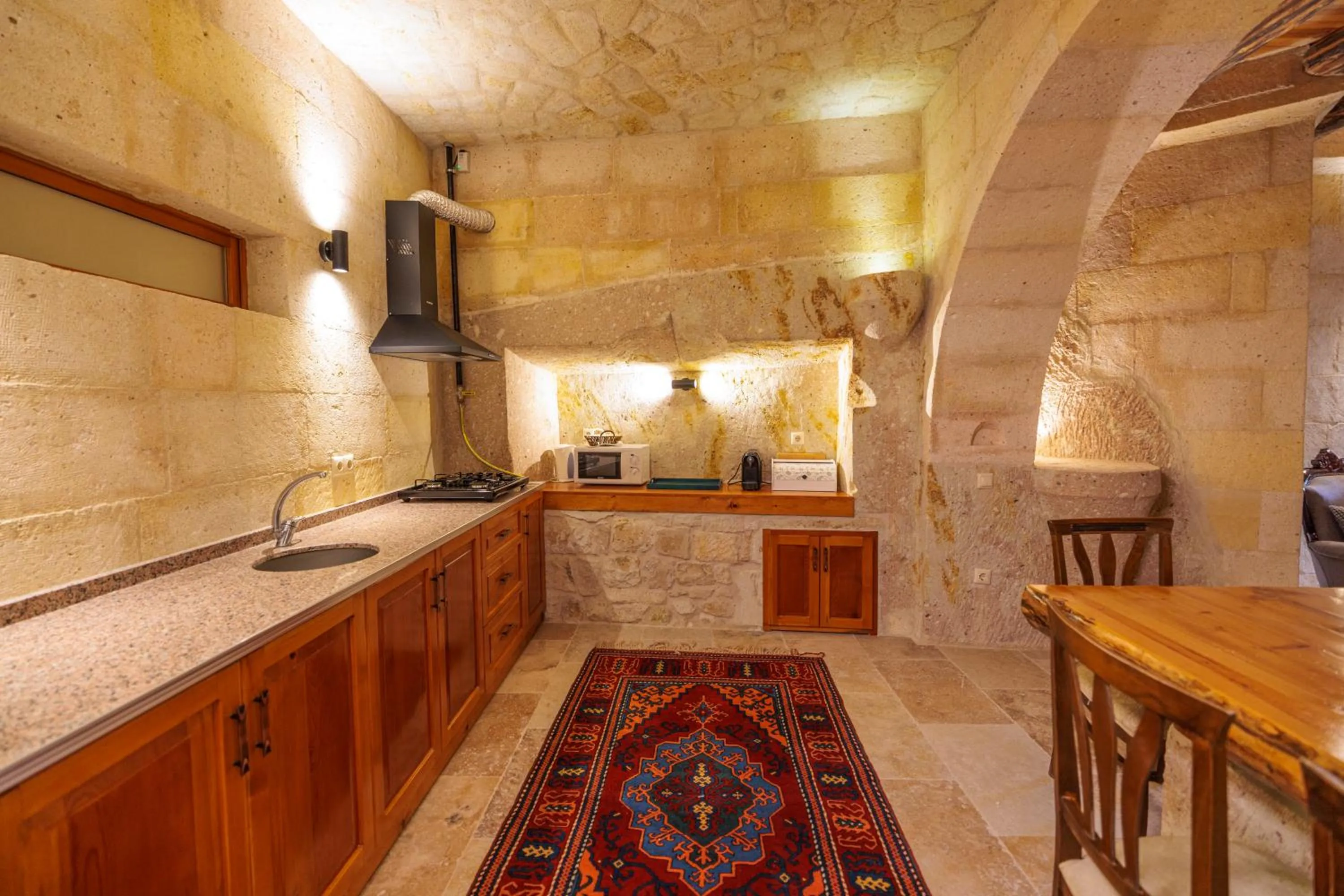 Kitchen or kitchenette in Canyon Cave Hotel