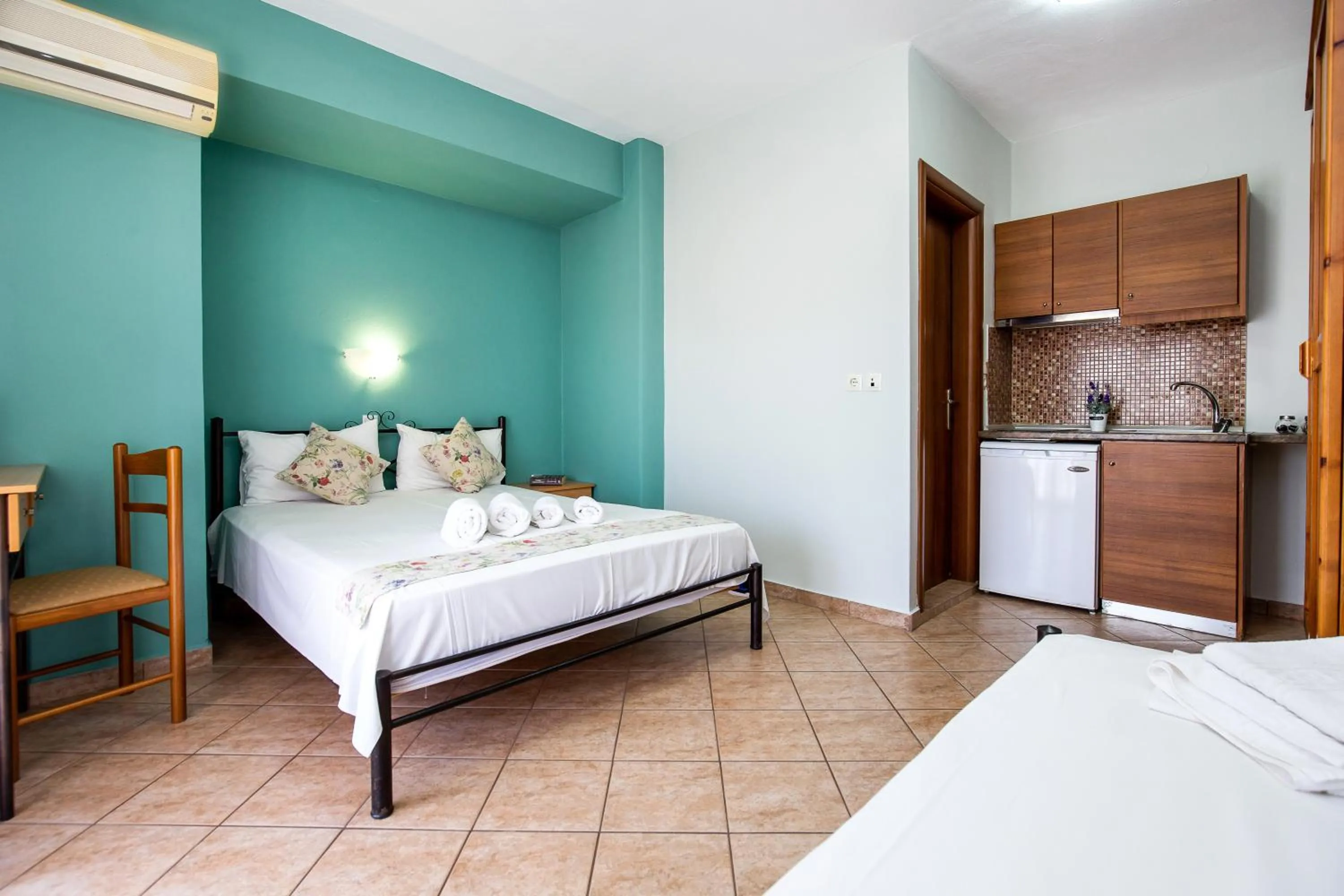 Bed in Famelia Studios Lampiris