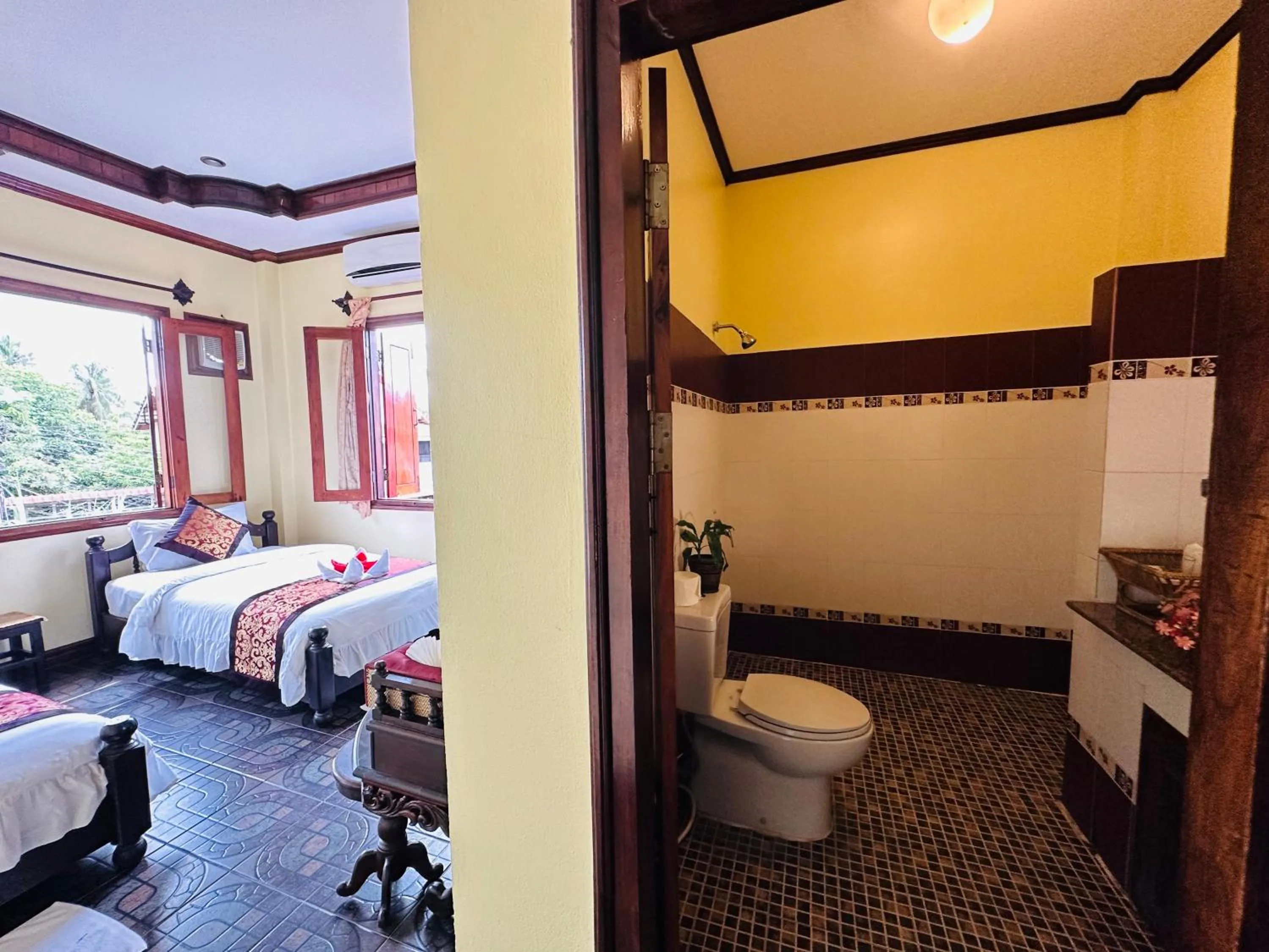 Toilet, Bed in Visoun Luang Prabang Hotel