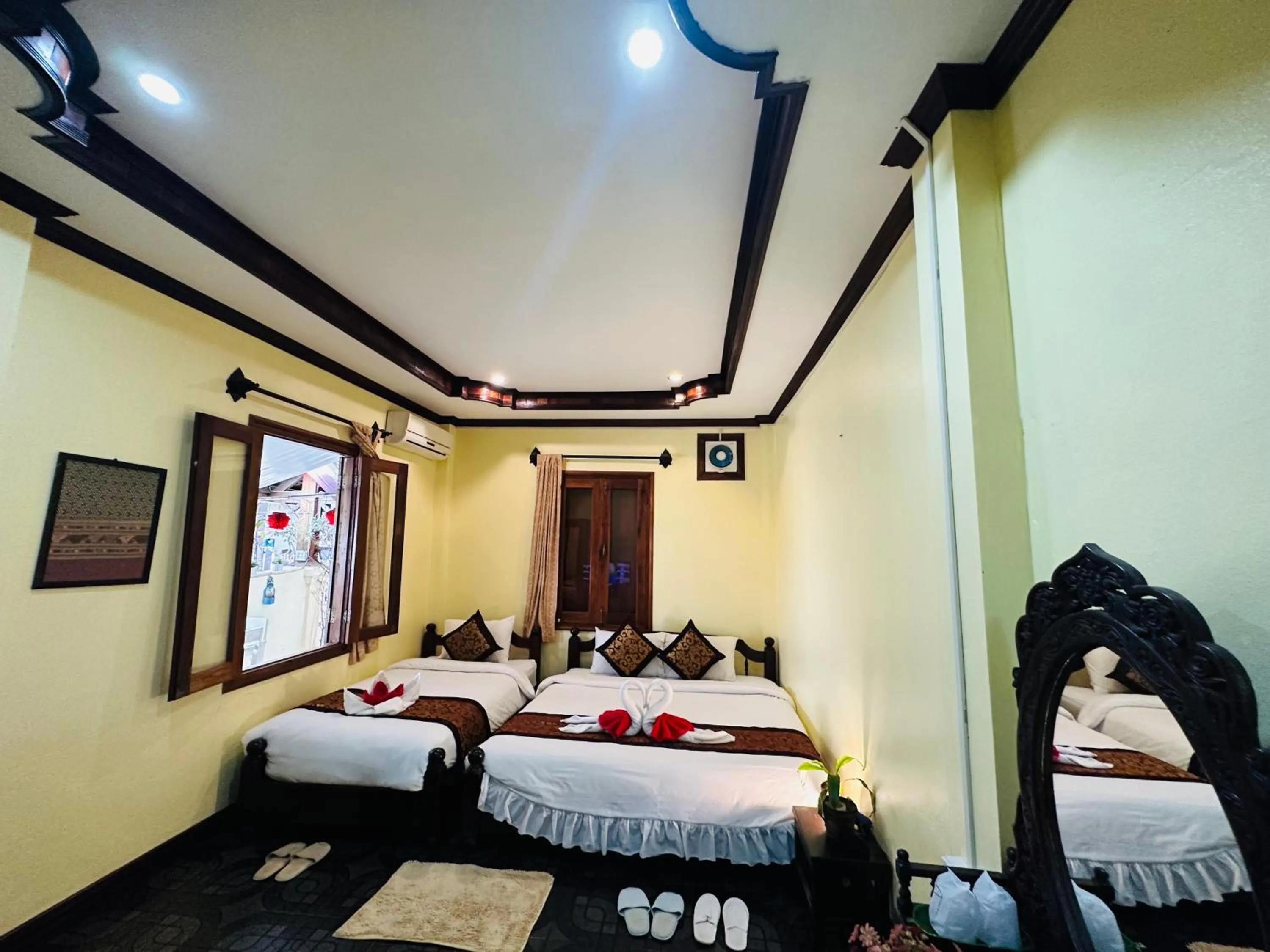 Bed in Visoun Luang Prabang Hotel