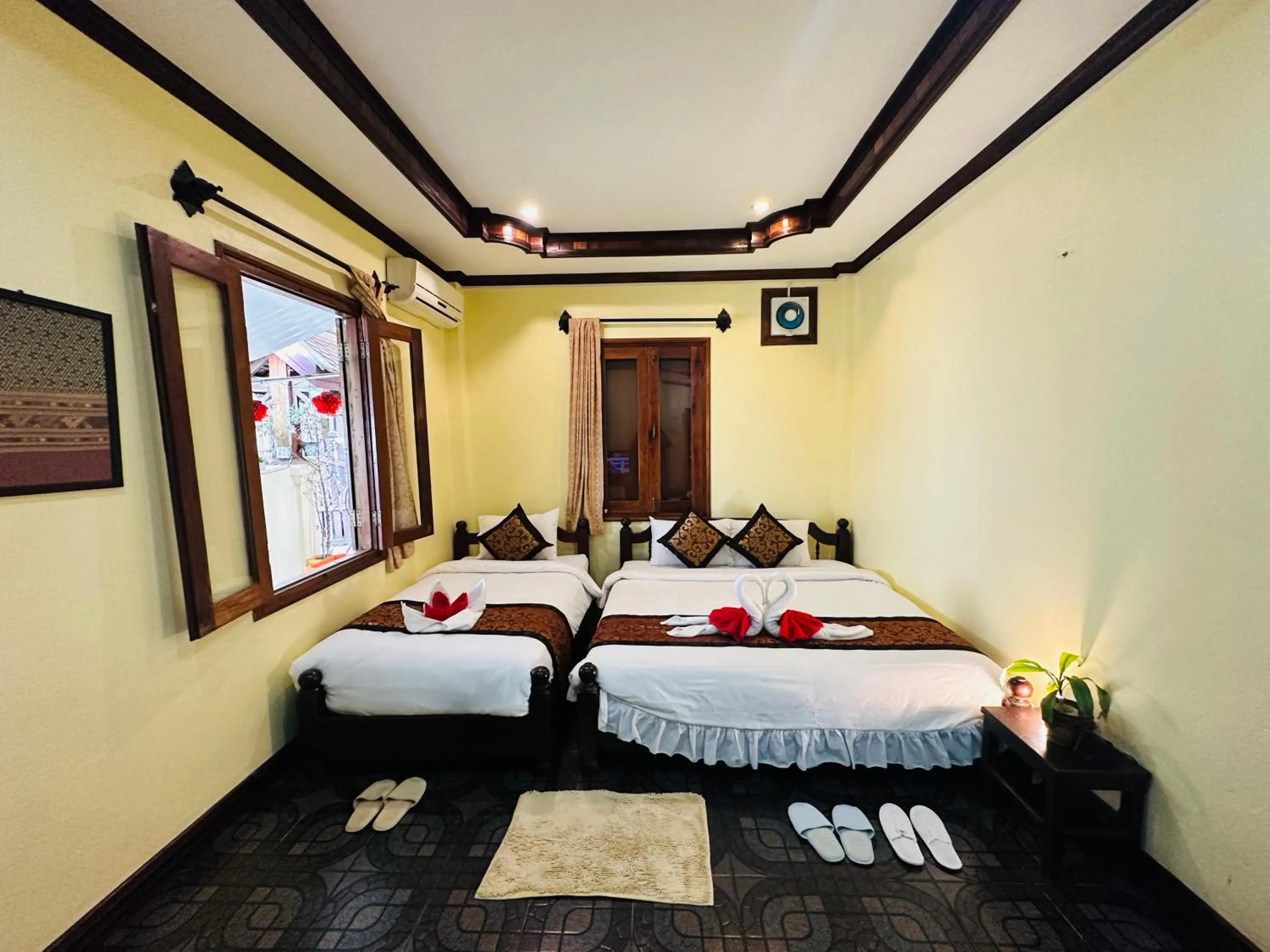 Bed in Visoun Luang Prabang Hotel